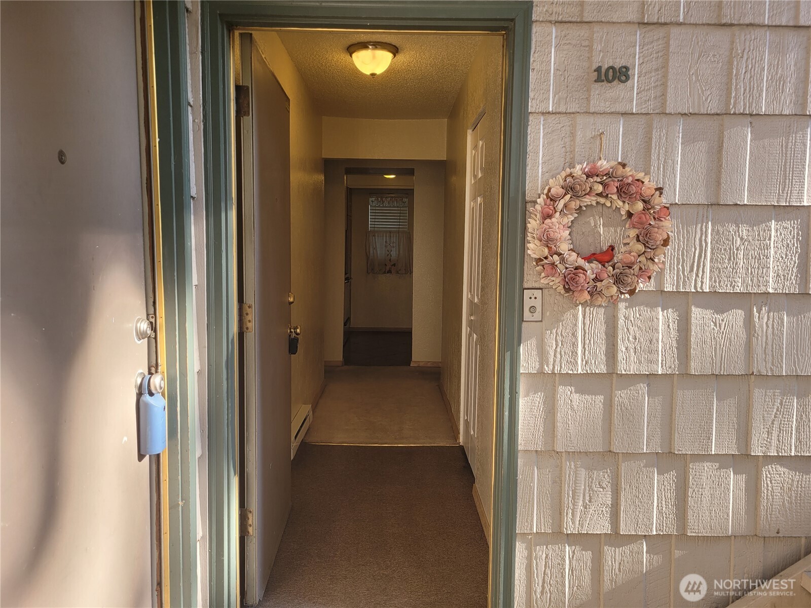 Nice long entry way and hall to the unit.