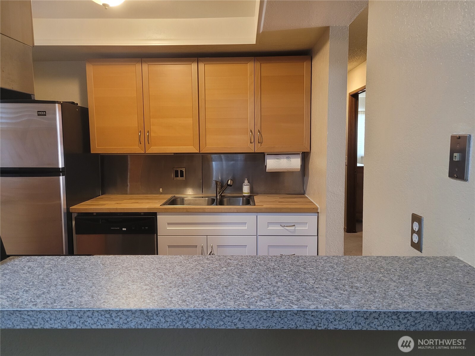 Looking into the kitchen through the galley.