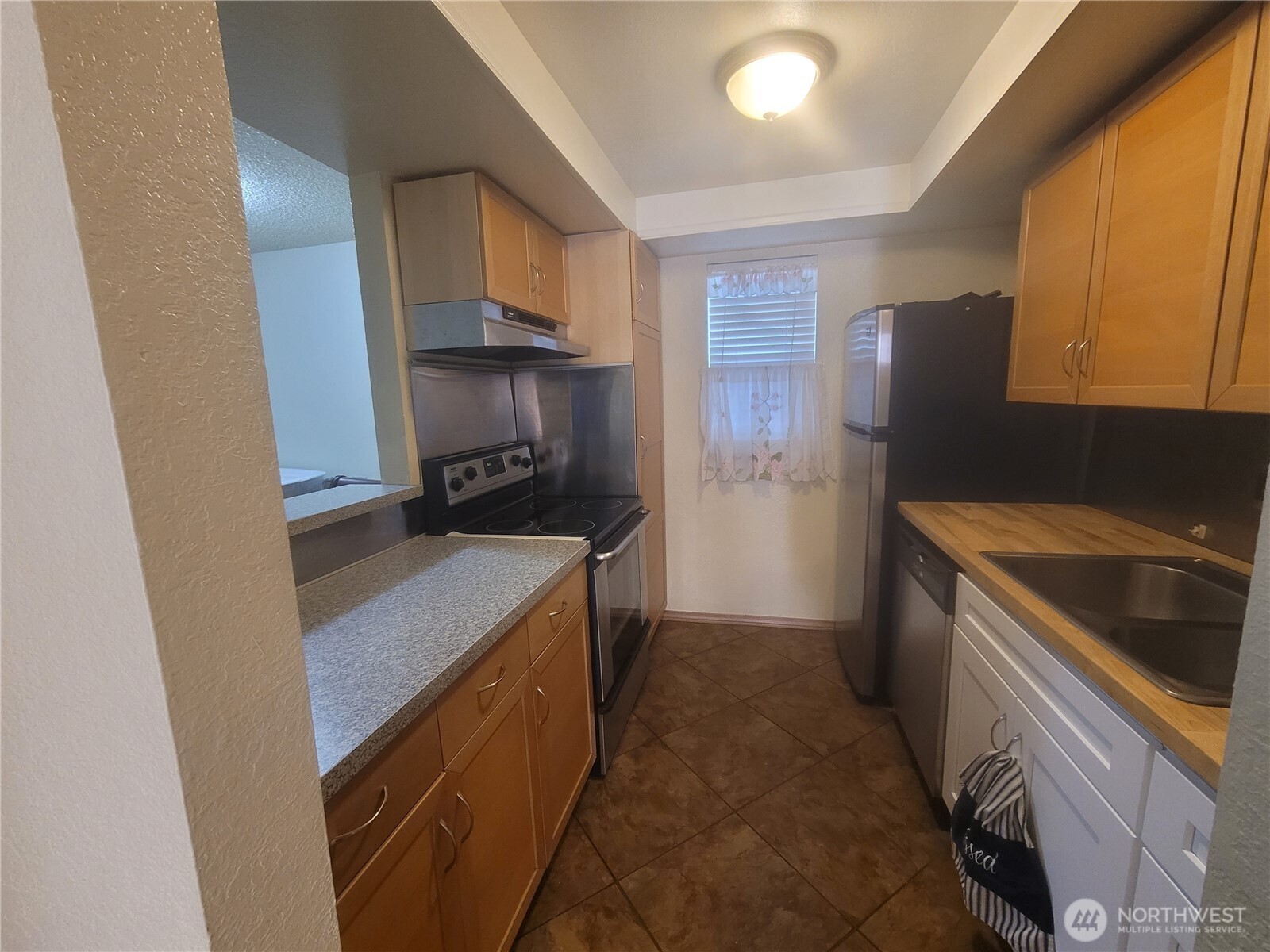 All brand new, kitchen cabinets, butcher block counters, and sink.
