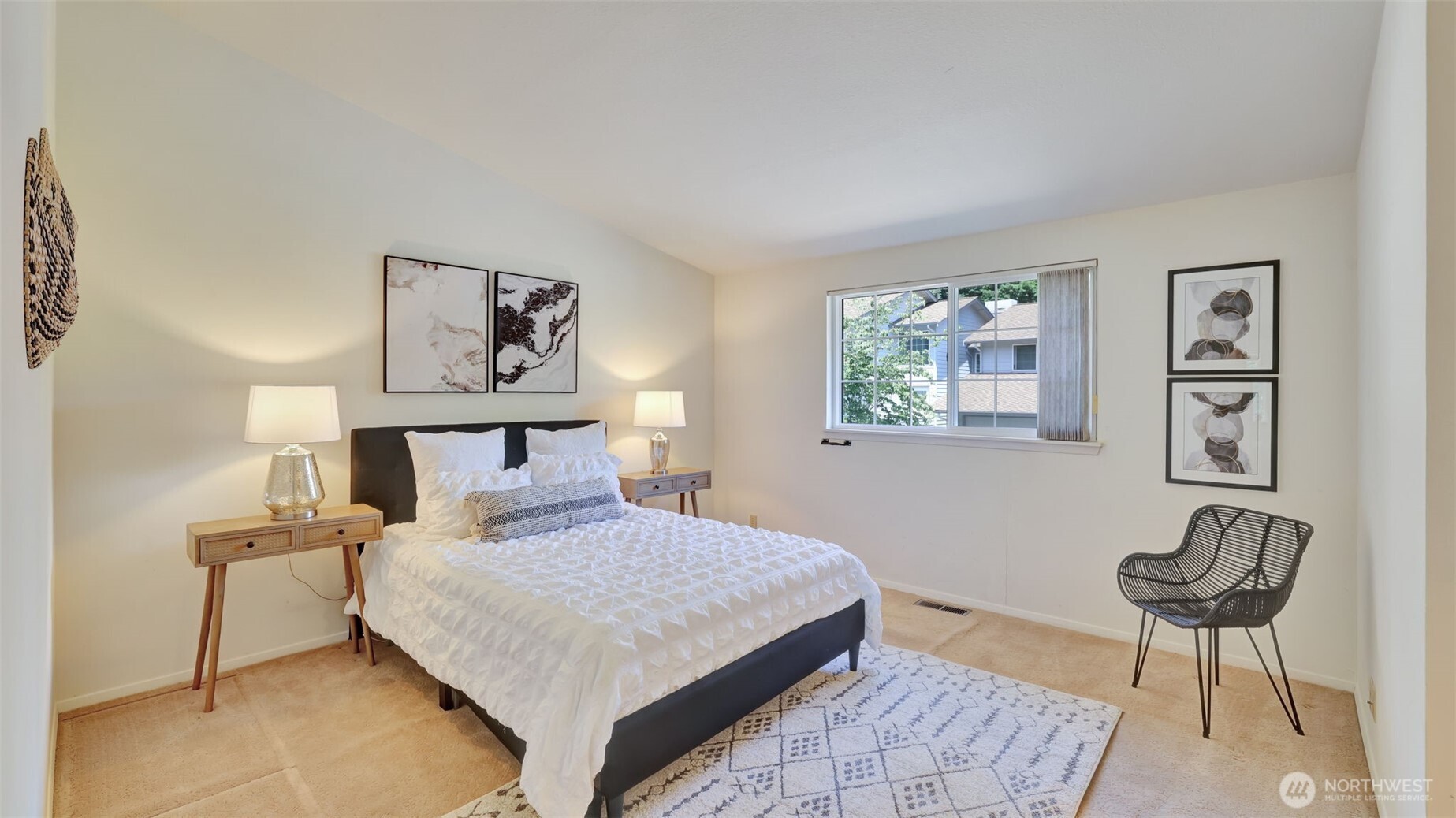 The primary bedroom combines a sleek design with natural light and spaciousness, perfect for adding seating areas beyond the bed