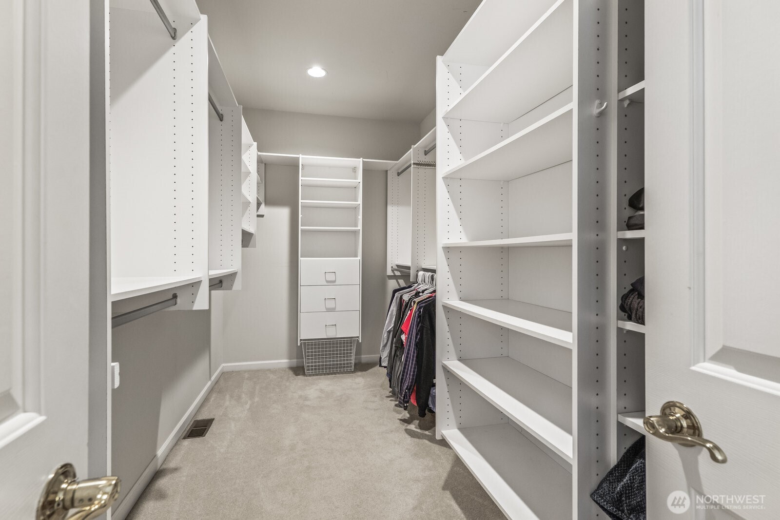 Large Primary bedroom walk-in closet.