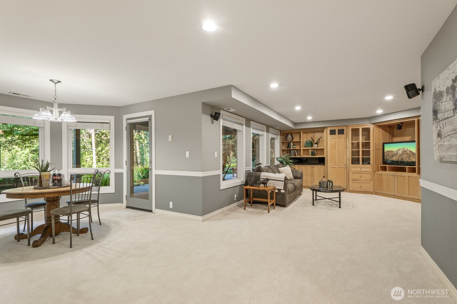 On the lover level you'll find a large rec room with maple built-ins, a door leading to the patio and backyard.