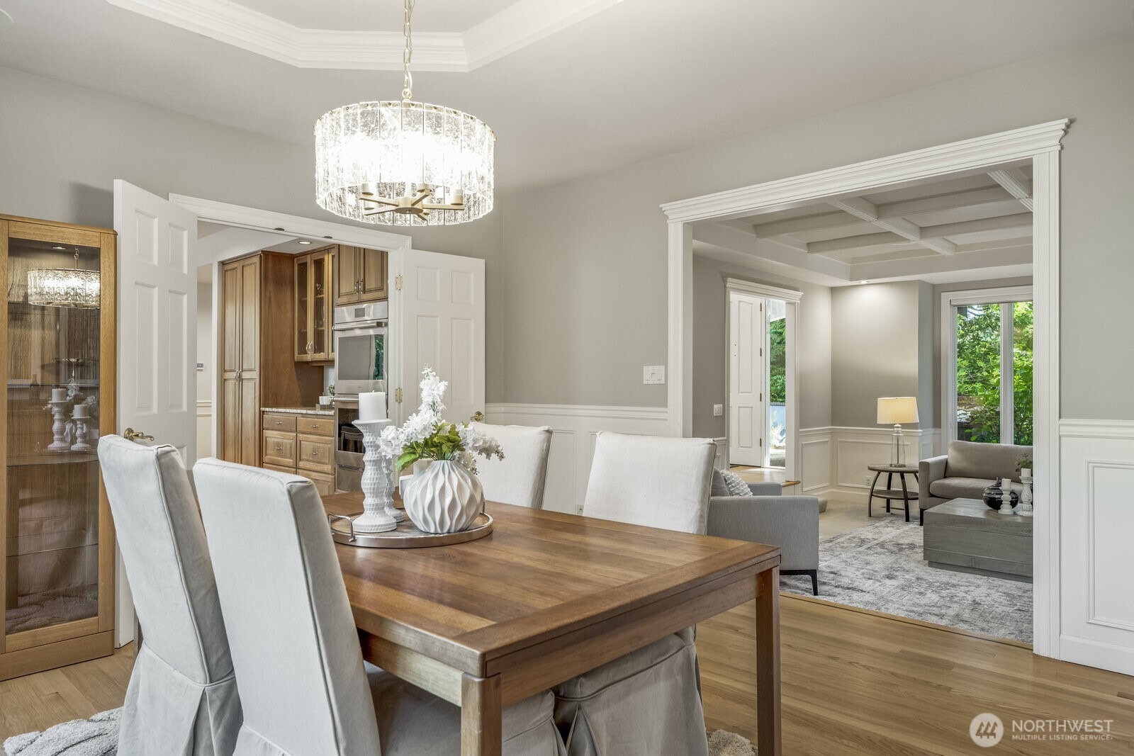 The dining room boasts a built-in buffet and new contemporary chandelier.