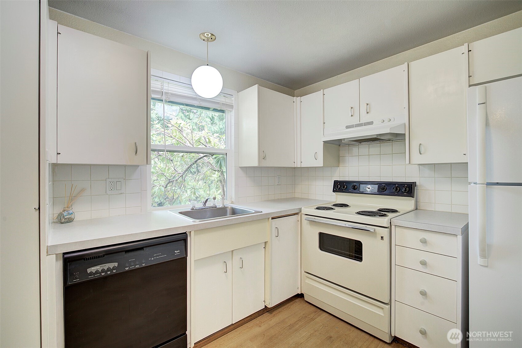 Kitchen overlooks the backyard