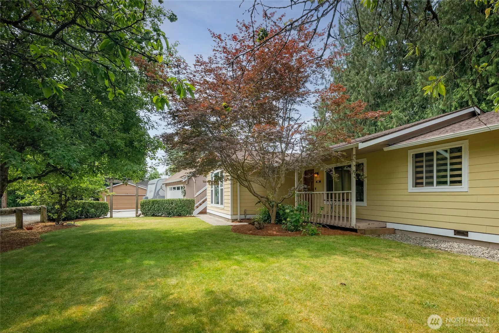 Mature apple & crabapple trees line your front yard
