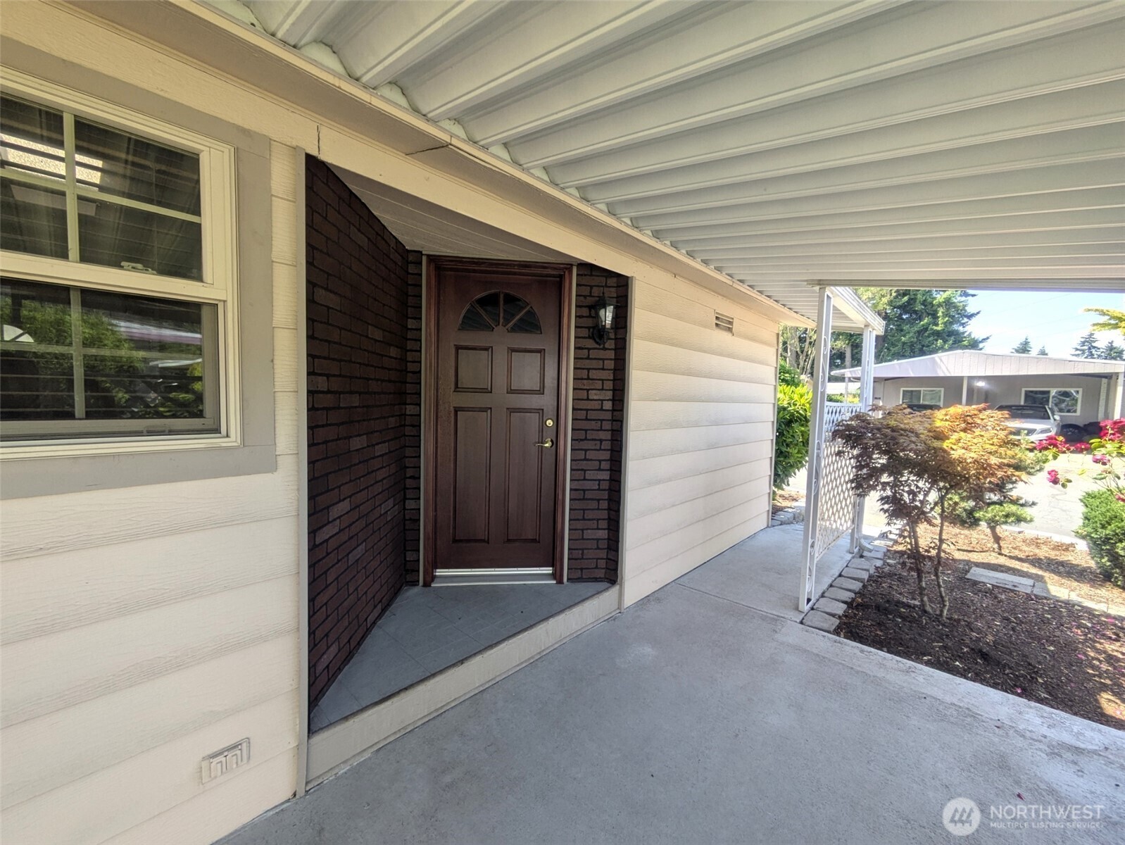 Front door with covered patio