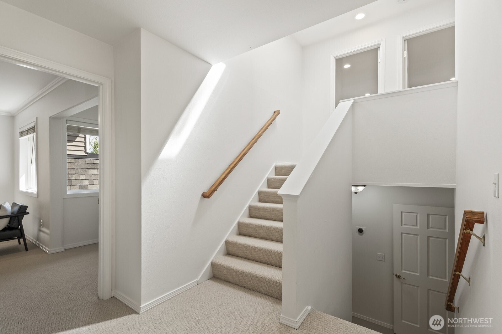 Stairs to the other 2 bedrooms.