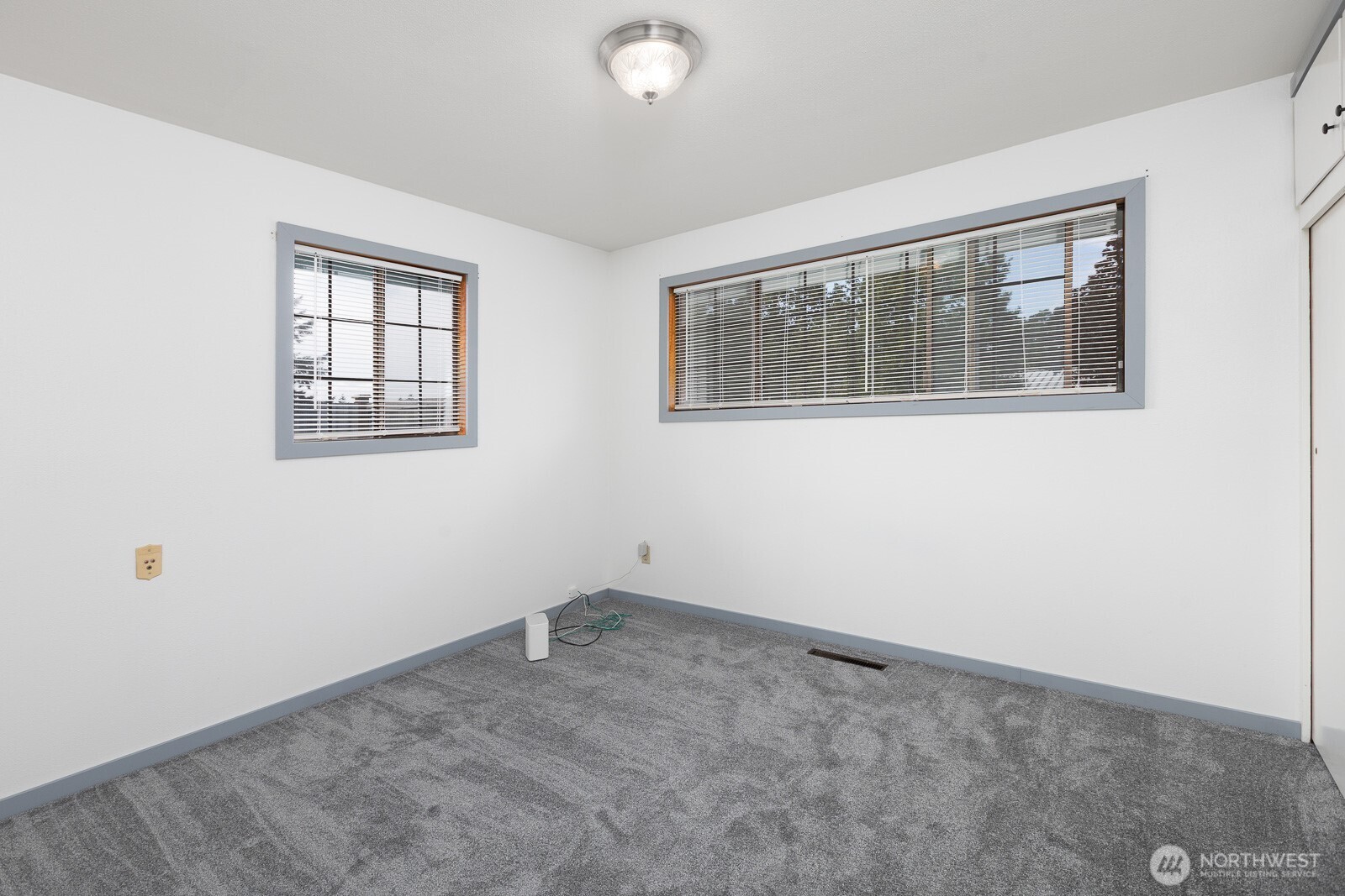 Second bedroom also with brand new carpet, trim, paint and lighting.