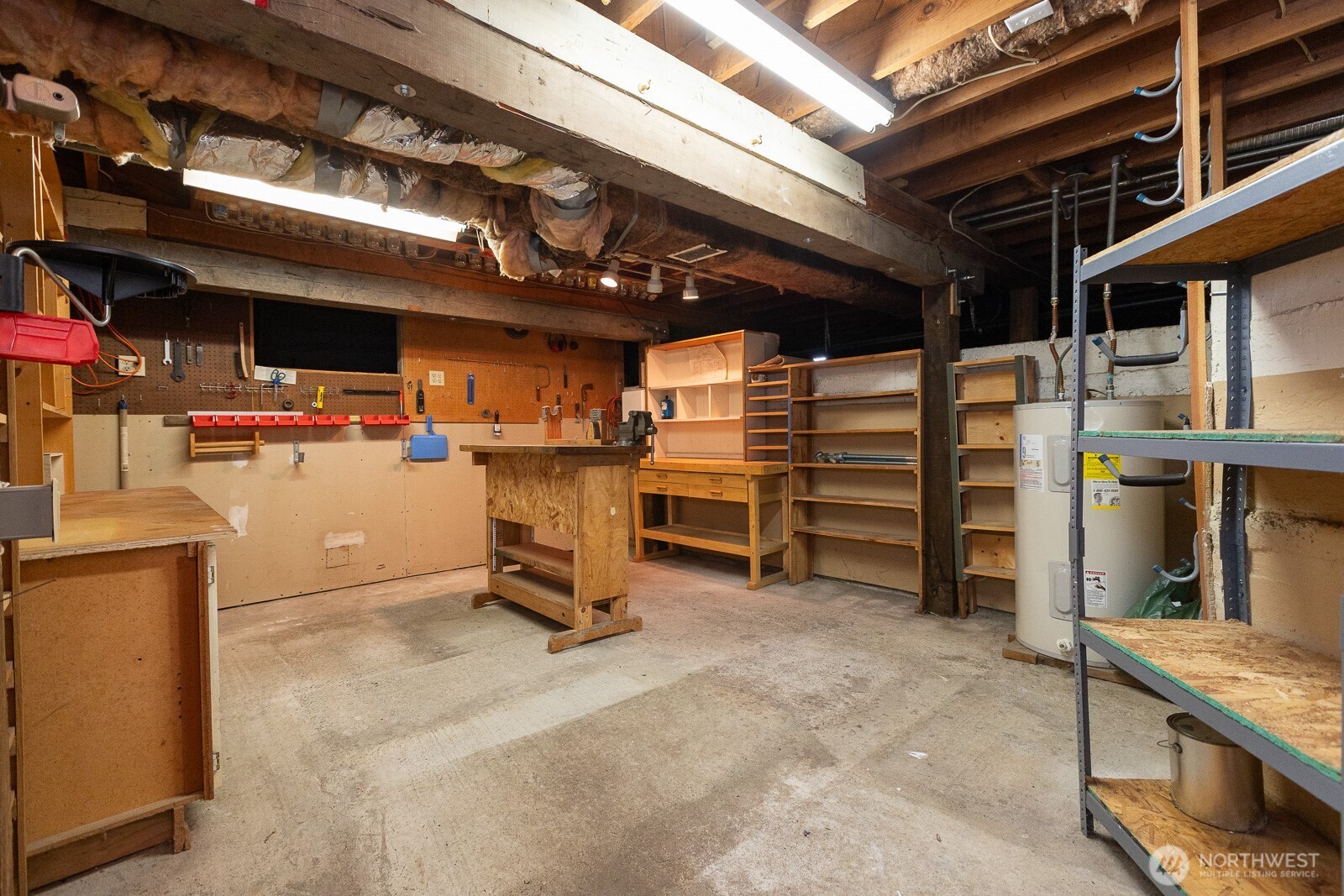 Nice cemented floor and storage spaces to your heart's content. What would you put in here? Water tank will be strapped by the time you see it!