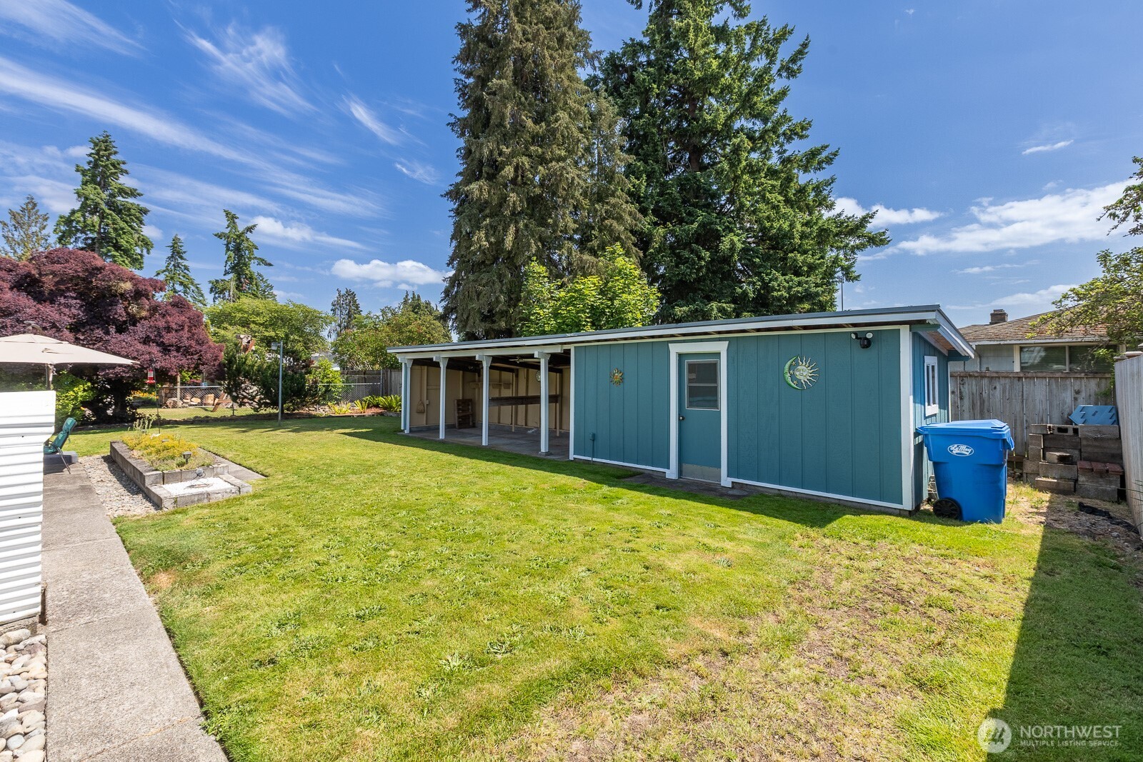This cool 3 bay storage area with a fully insulated shed with power, will hold tons of your things! It also provides additional privacy from the neighbors in the back!