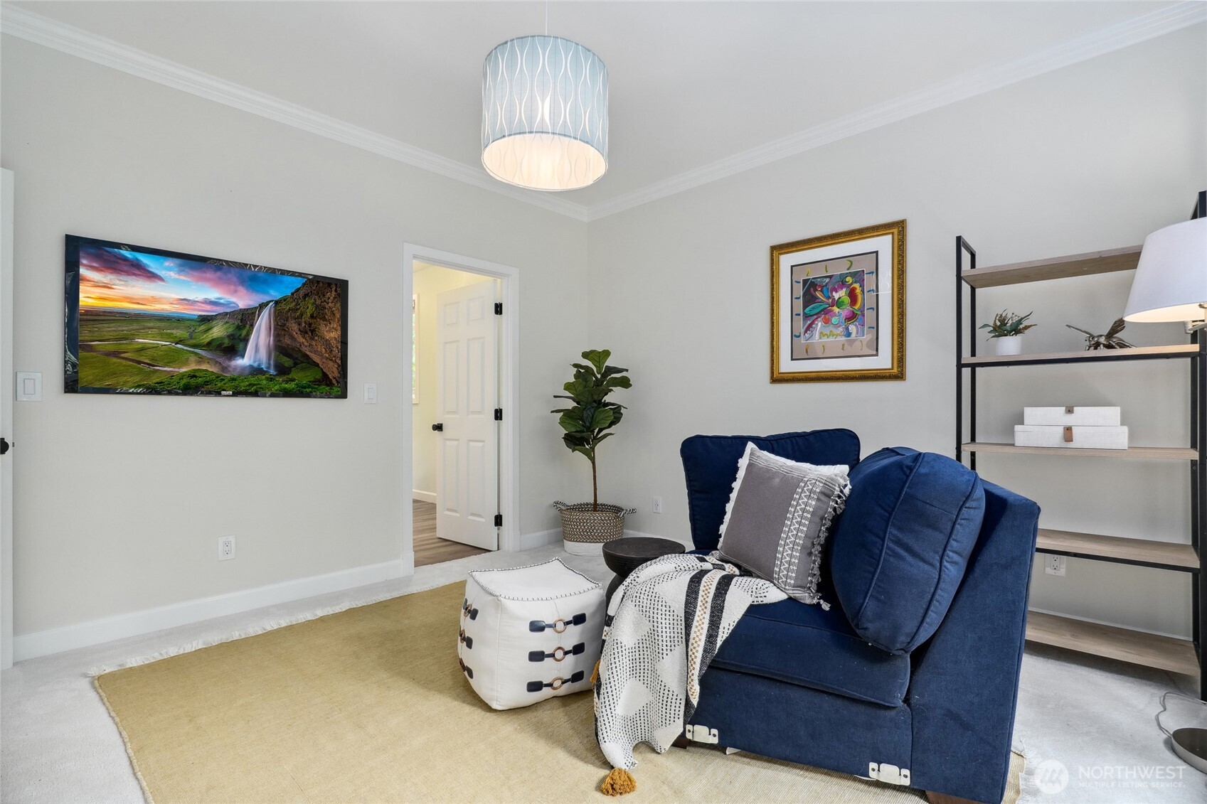 Located on the main floor just beside the front door, this versatile room can serve as a bedroom, office, or bonus space