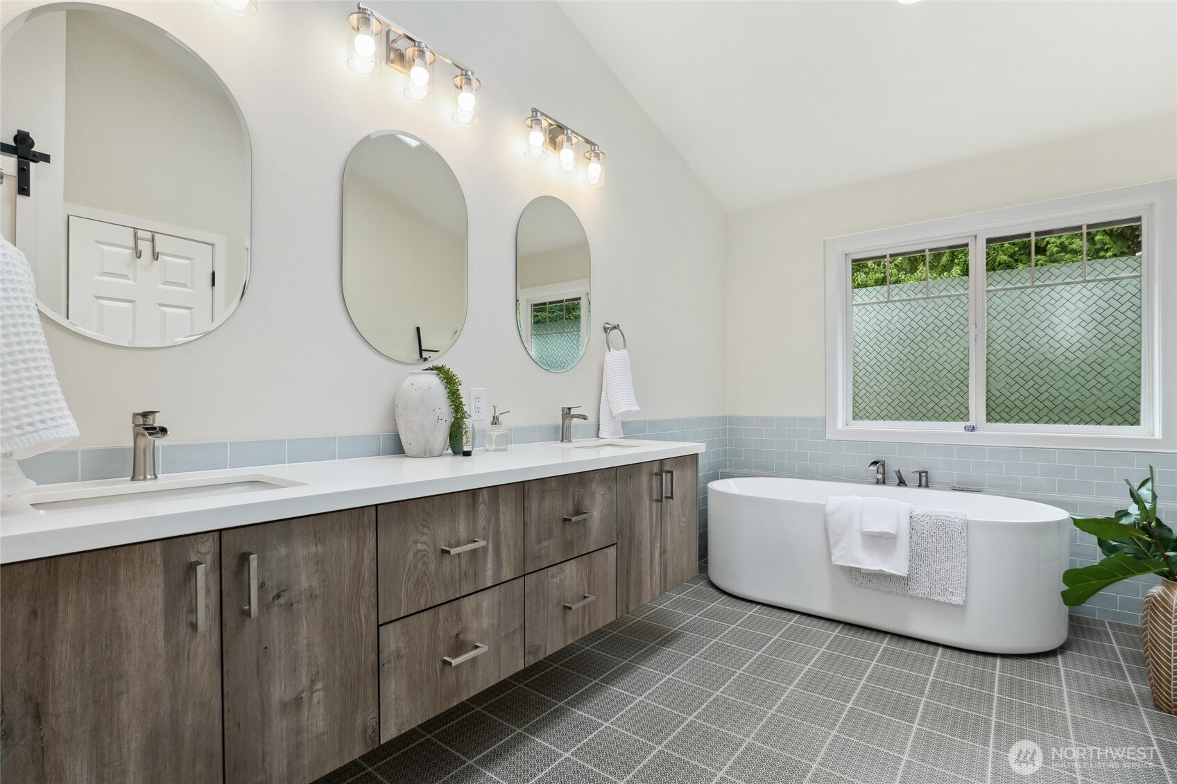 Fully updated primary bathroom with deep soaking free-standing tub