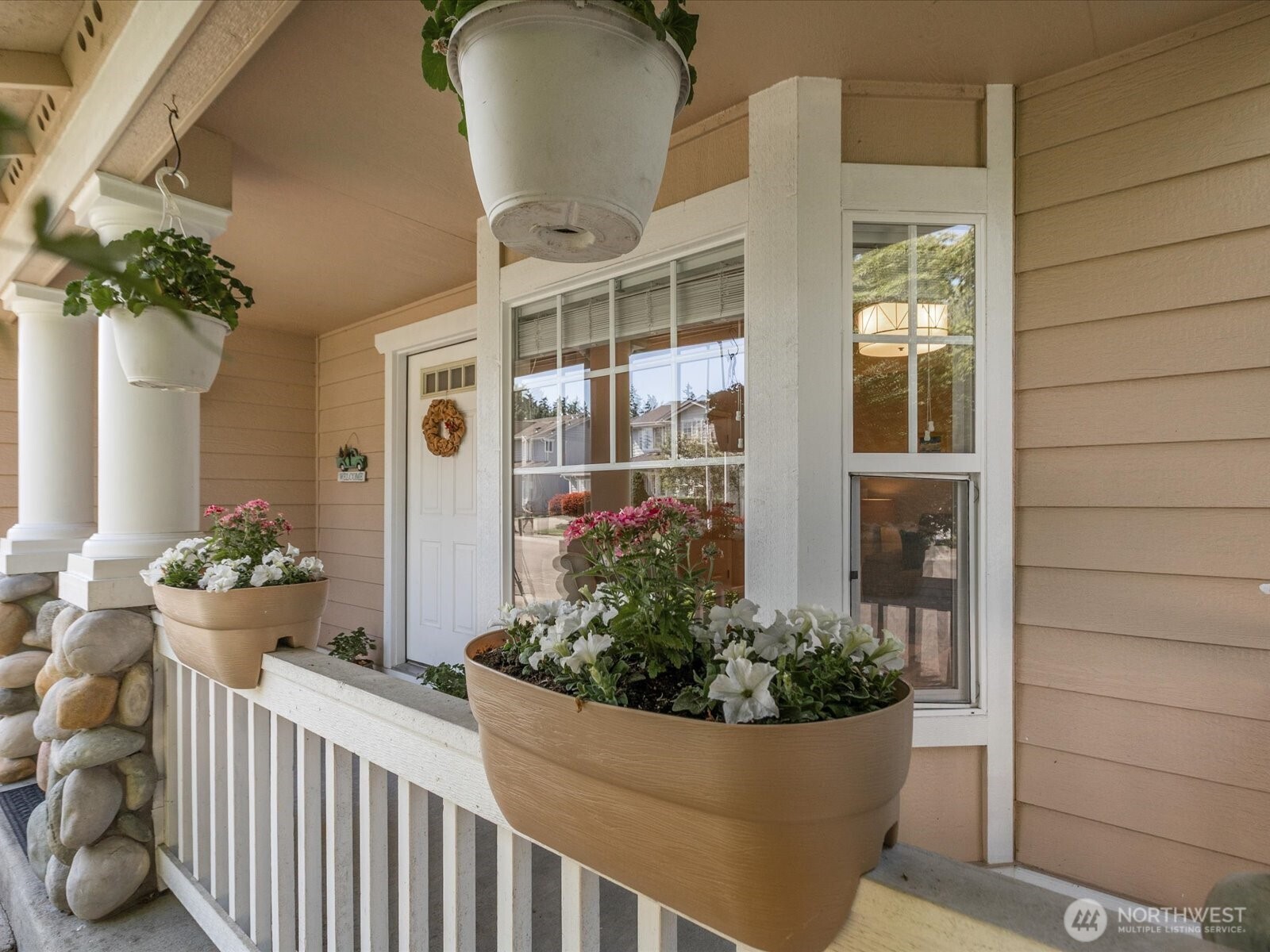 Welcoming front entry covered porch