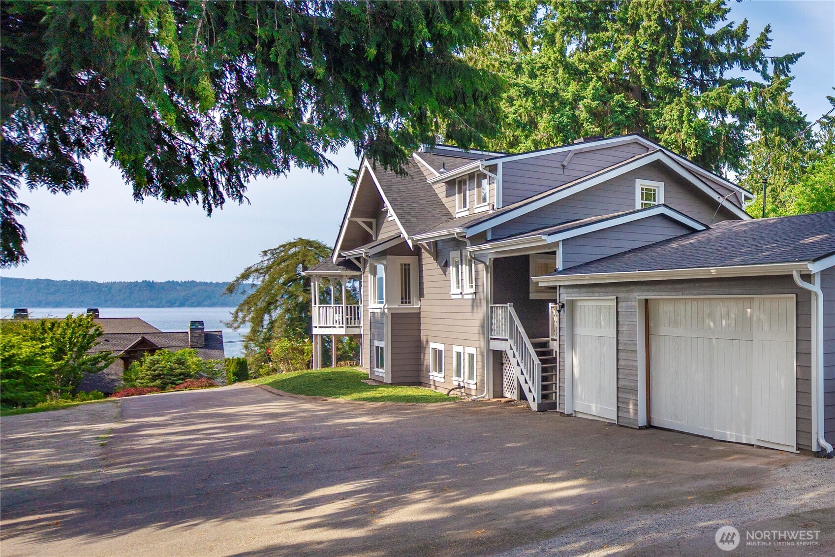 Located on a shy acre overlooking the Puget Sound!