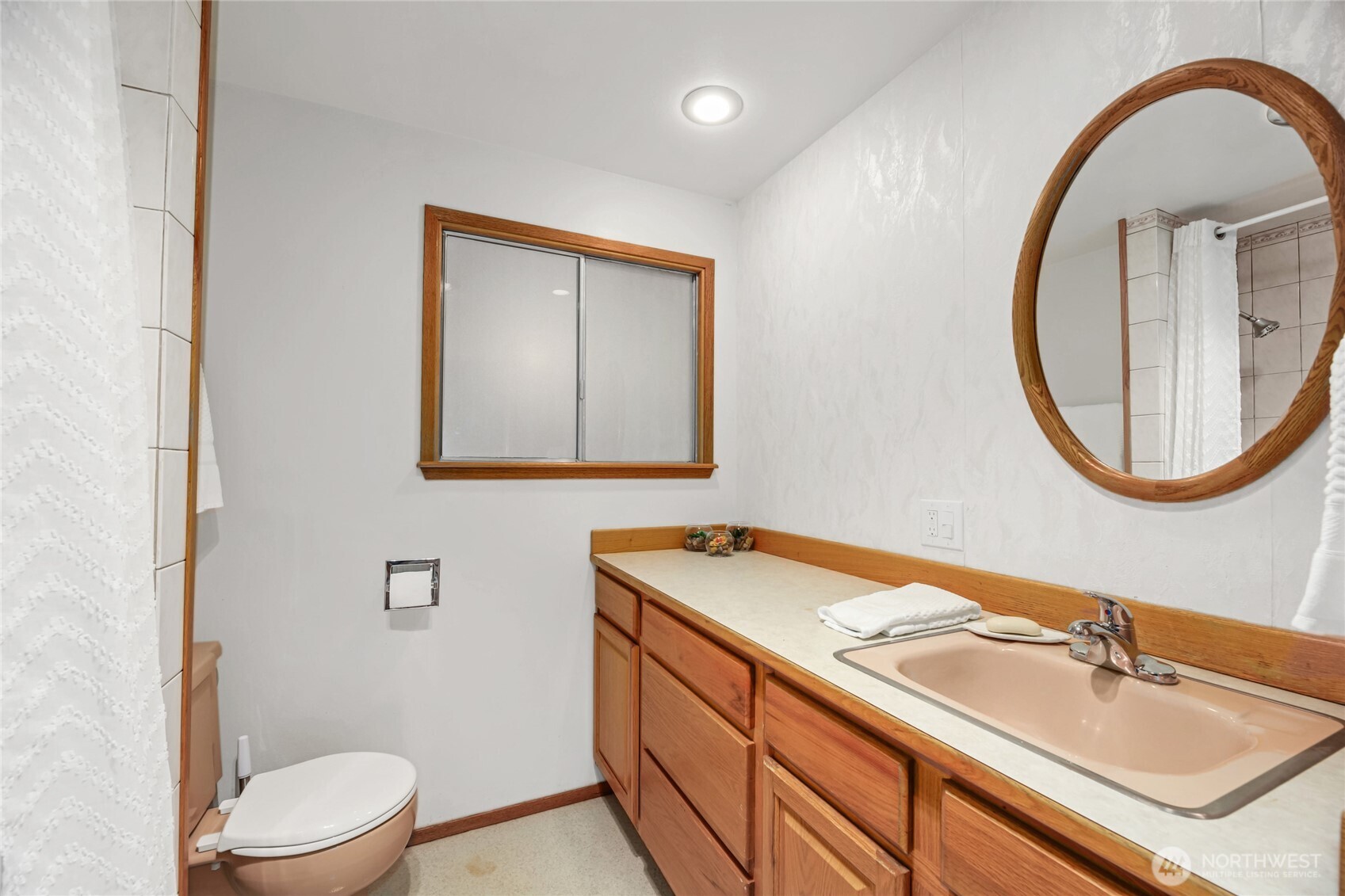 Full Bathroom off main/upper floor Hallway.