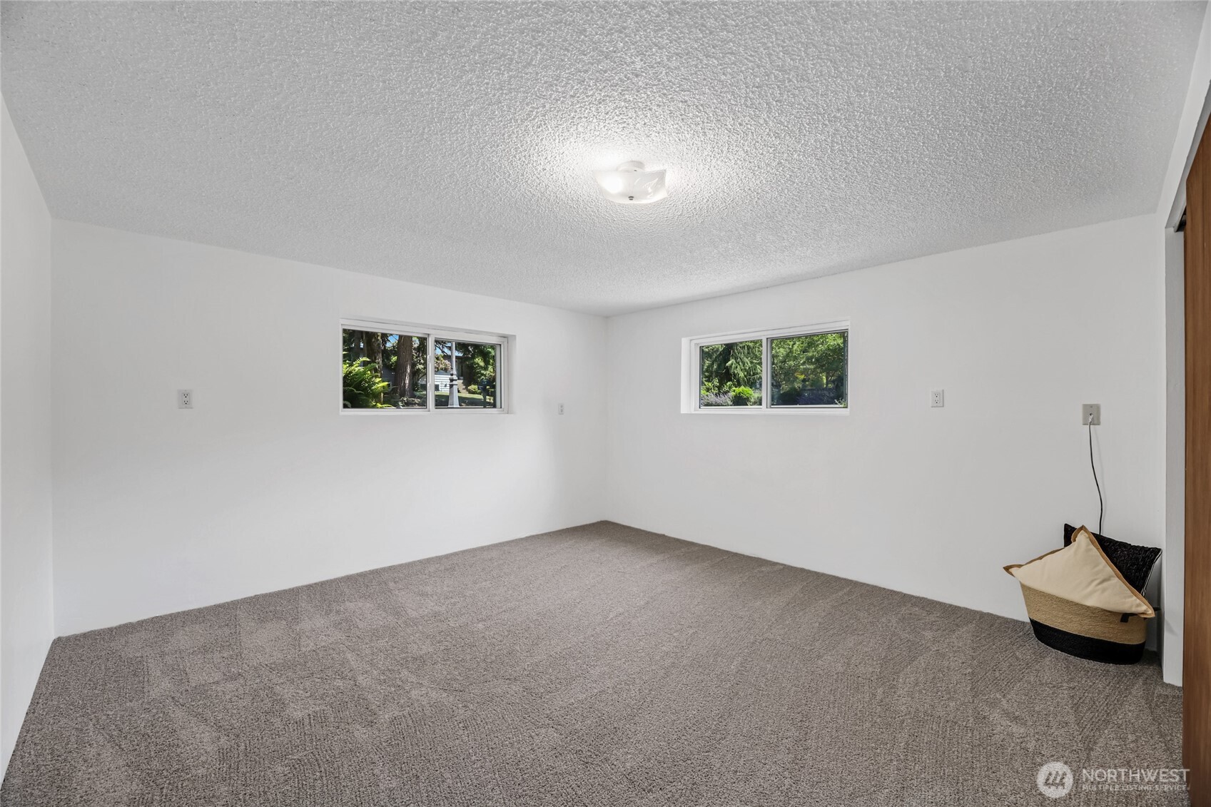 Bedroom 5 of 6 located on lower floor. Double pane vinyl windows and Brand new carpet. High speed internet.
