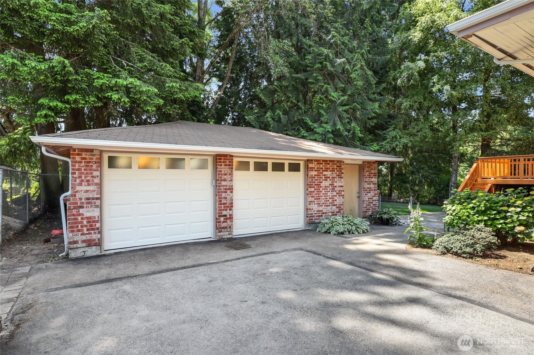 Detached 2 Car Garage has seperate workshop room and sperate storage room.