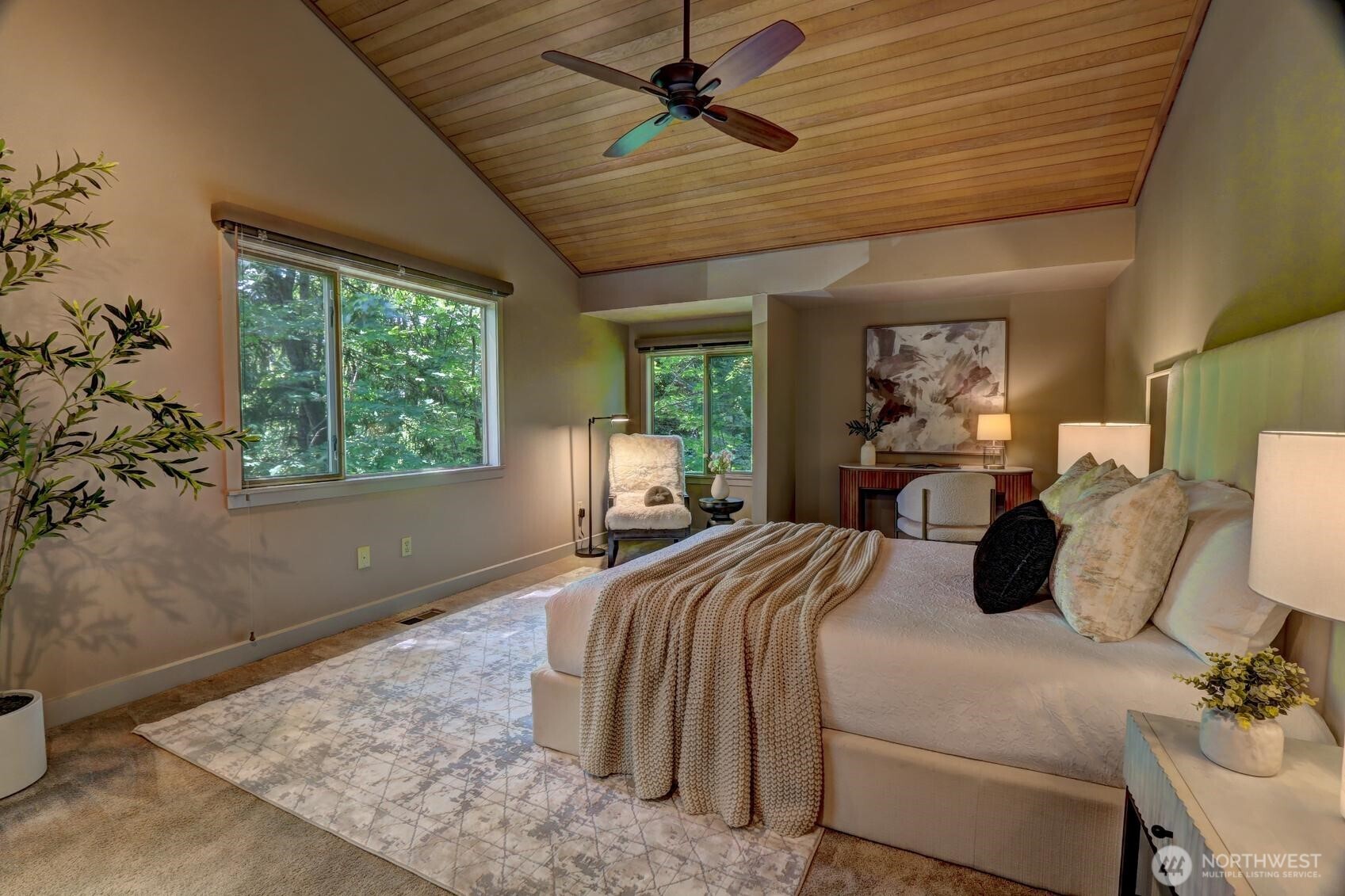 Large primary with vaulted ceilings, nature abounds....