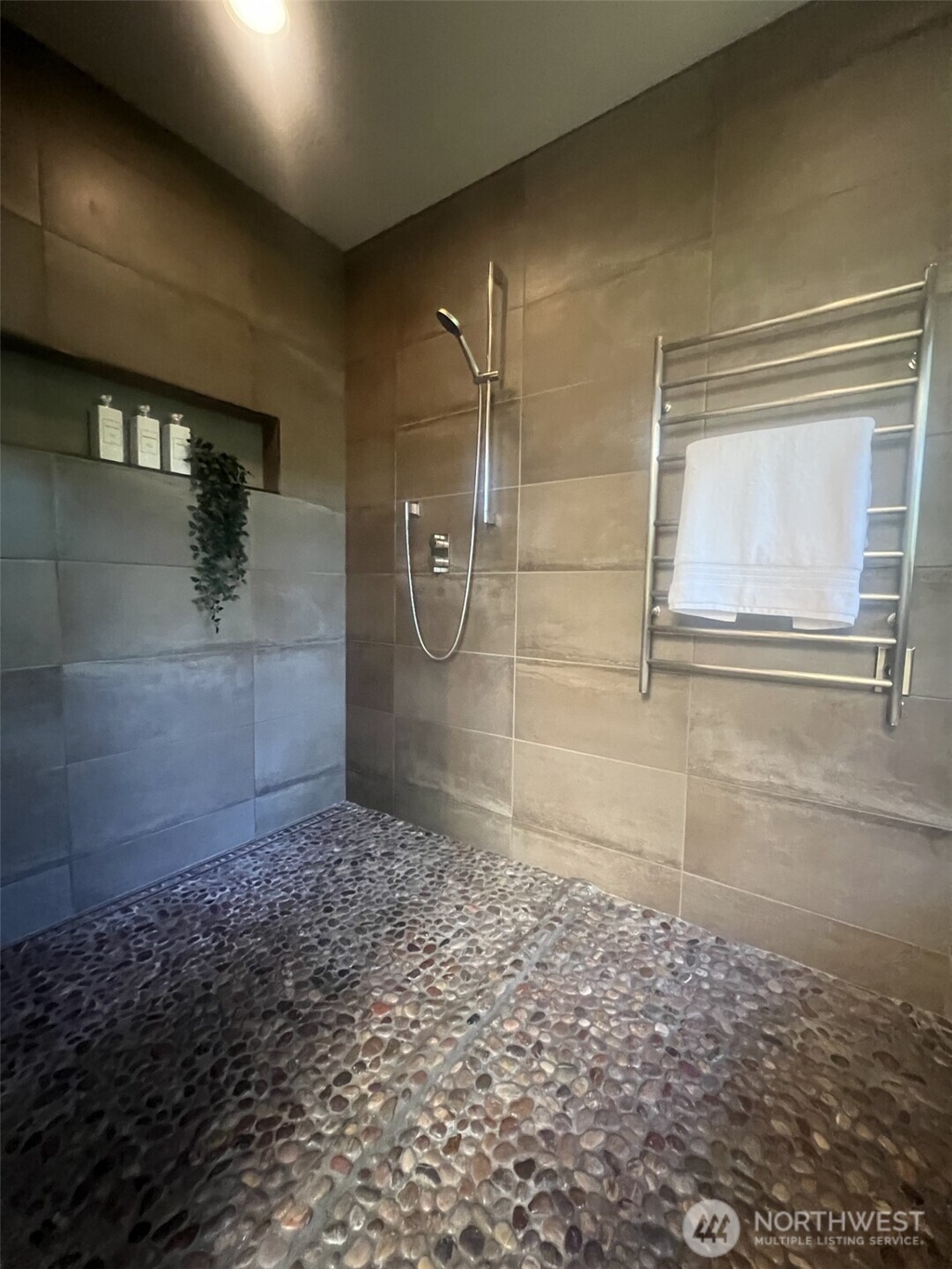Huge custom shower with towel heater