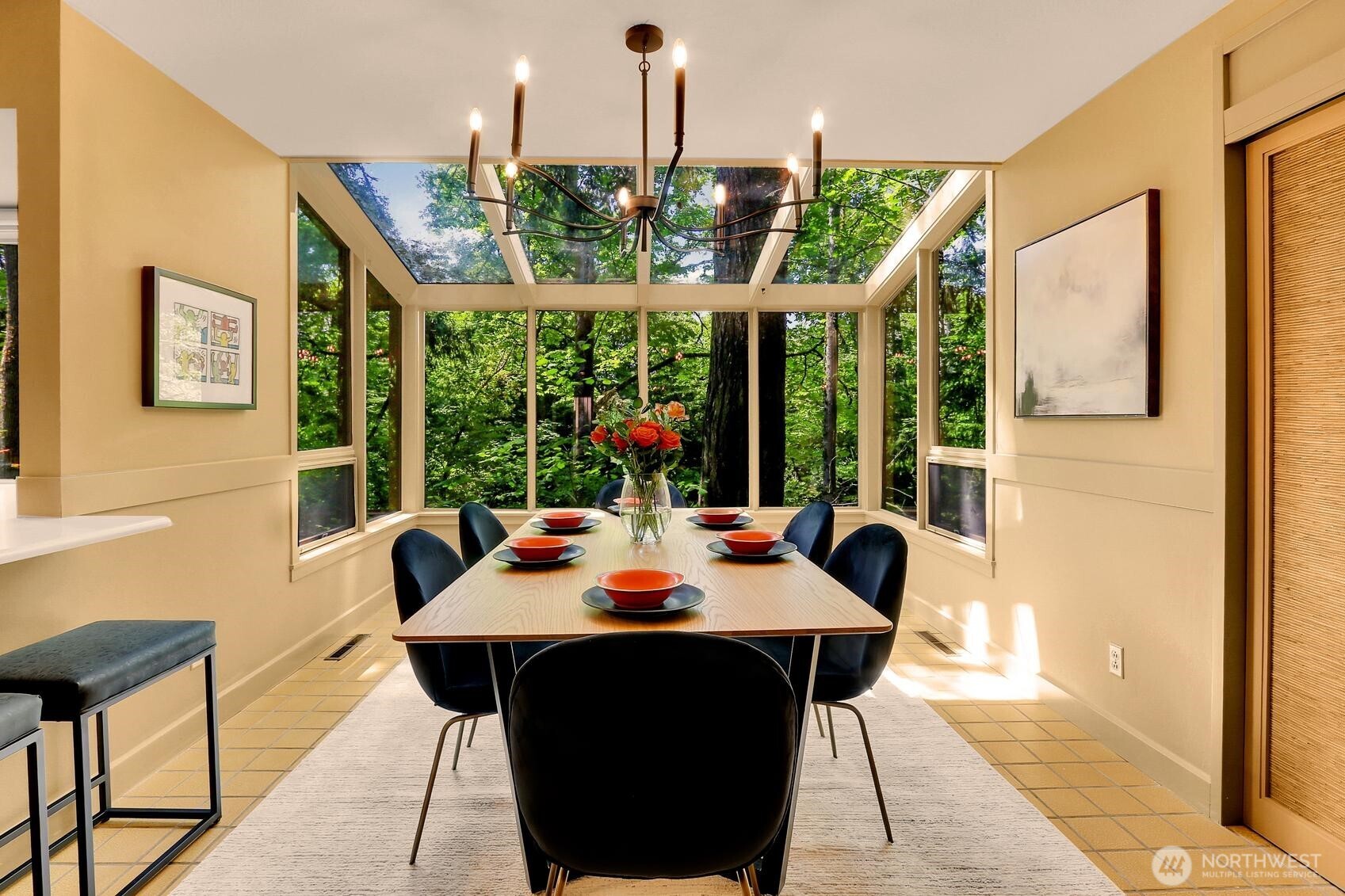 Beautiful glassed in dining room with lots of storage