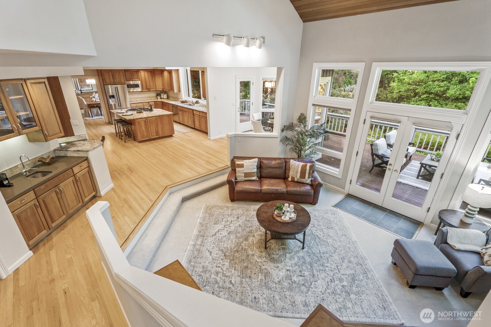 Additionally in this area there is a planning desk and beverage/coffee bar with a sink.