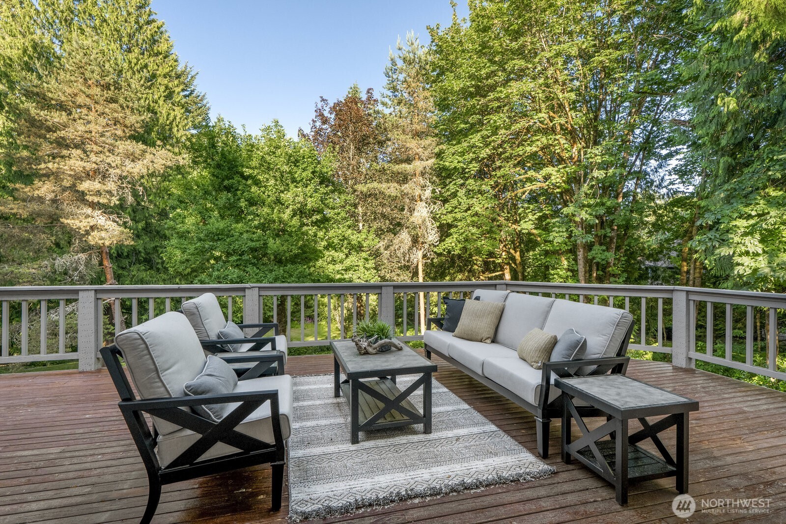 Extensive entertaining deck space with view of the gardens.