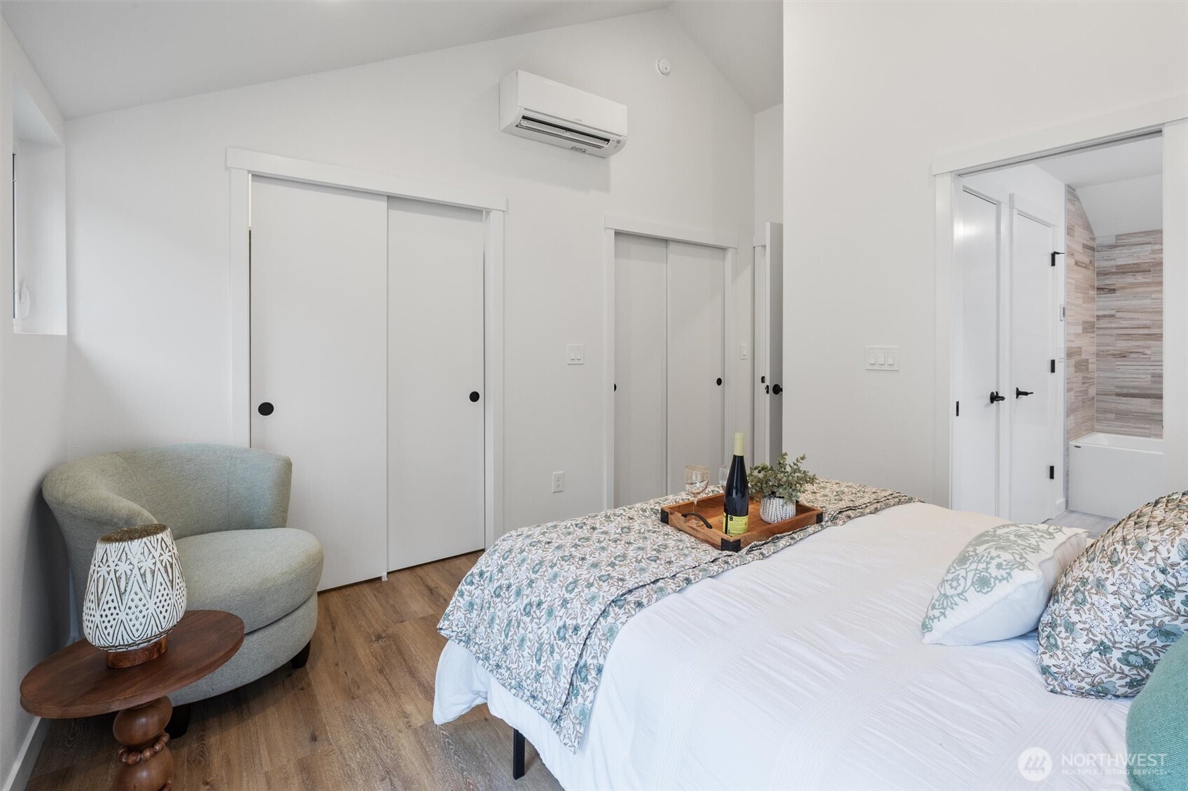Dual closets and a sleek mini-split system ensure comfort and convenience in the primary suite.