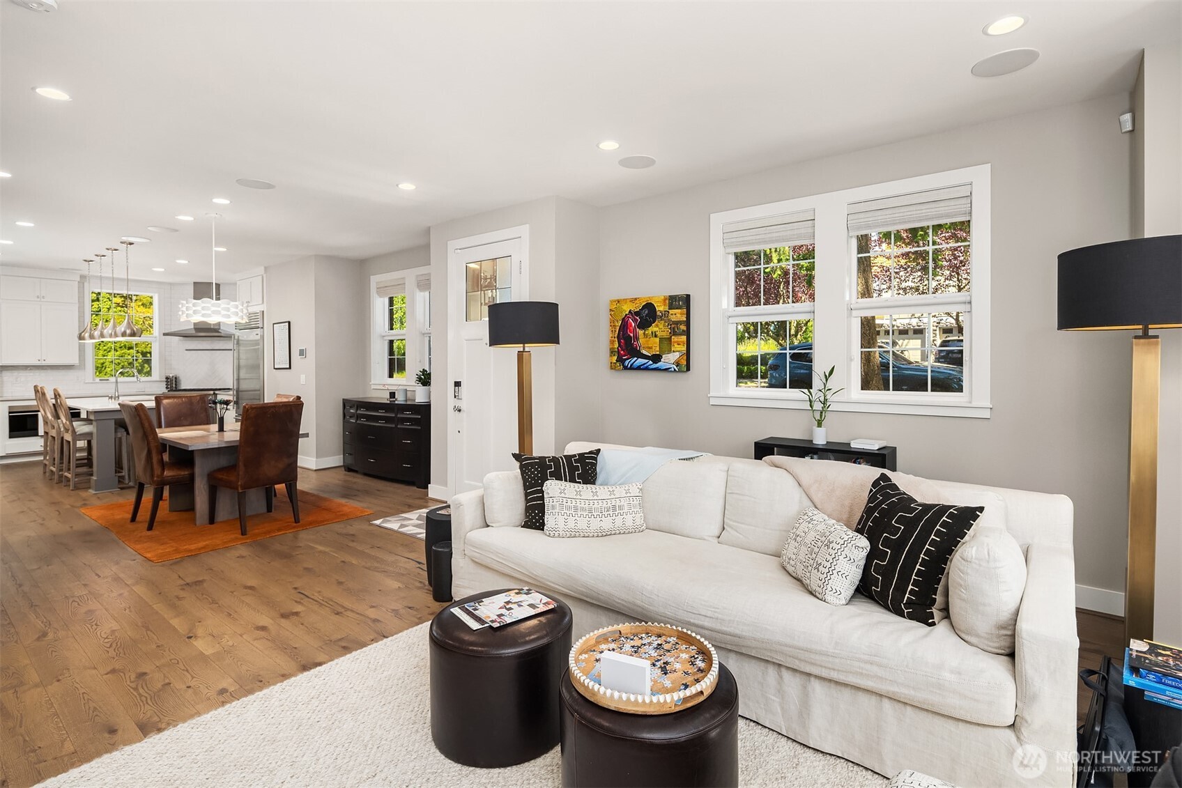 An open layout seamlessly connects the kitchen, dining, and living areas — perfect for effortless entertaining and everyday elegance.