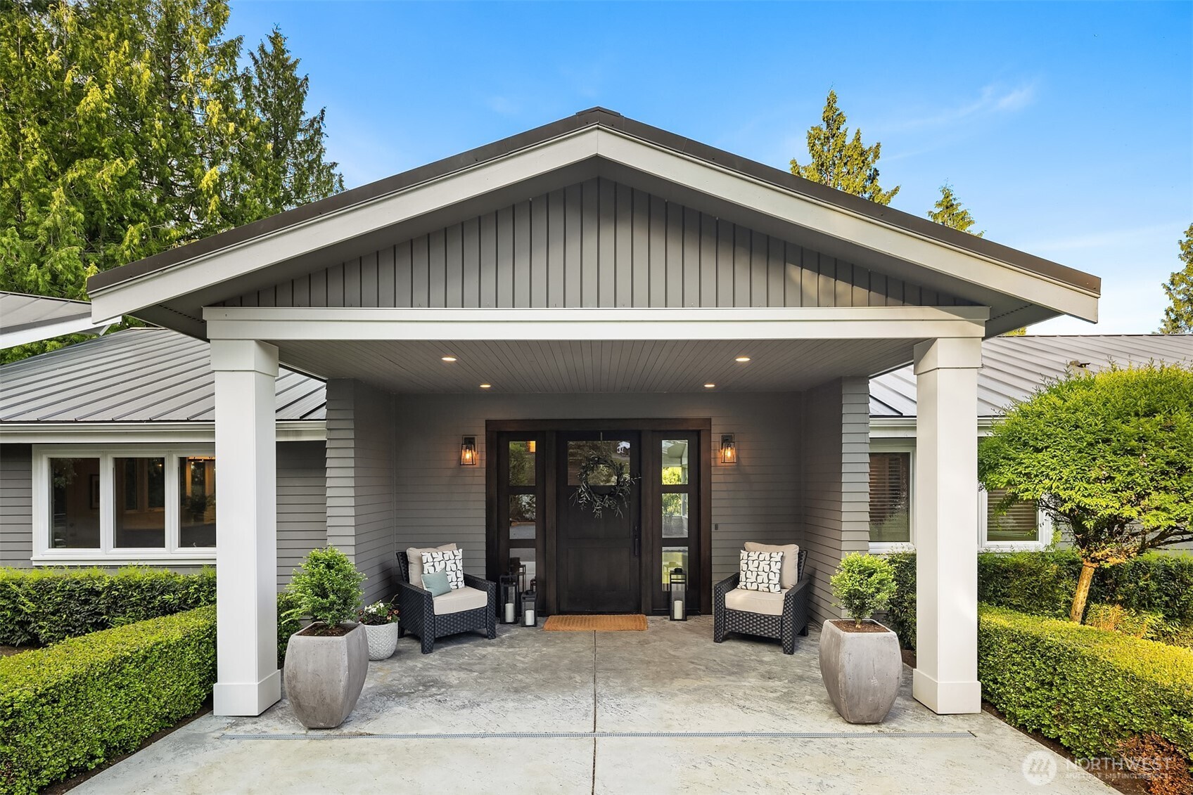 This beautifully remodeled mid-century masterpiece, originally designed by Roland Terry Architects, has been thoughtfully updated for modern living and is ready to host your summer fun.