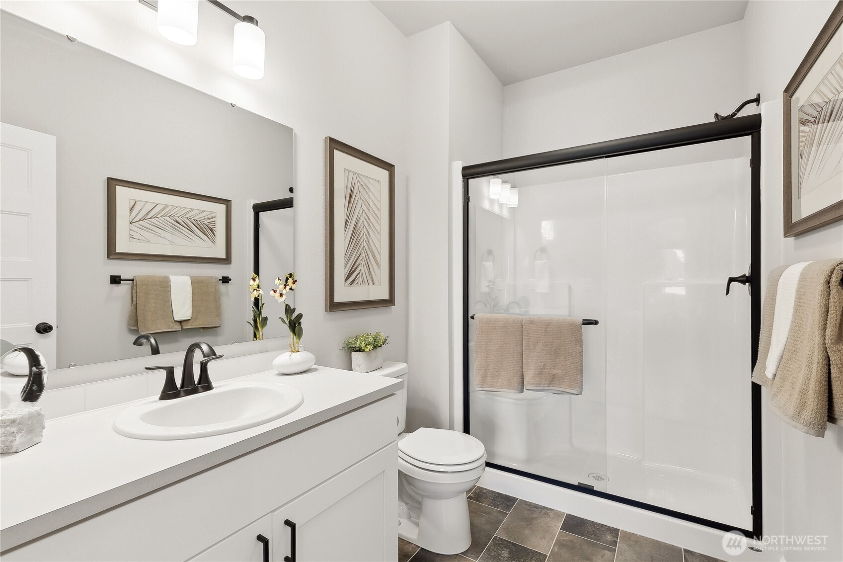 Jr suite bathroom - Photos are of Sterling model home. Colors and features will vary.