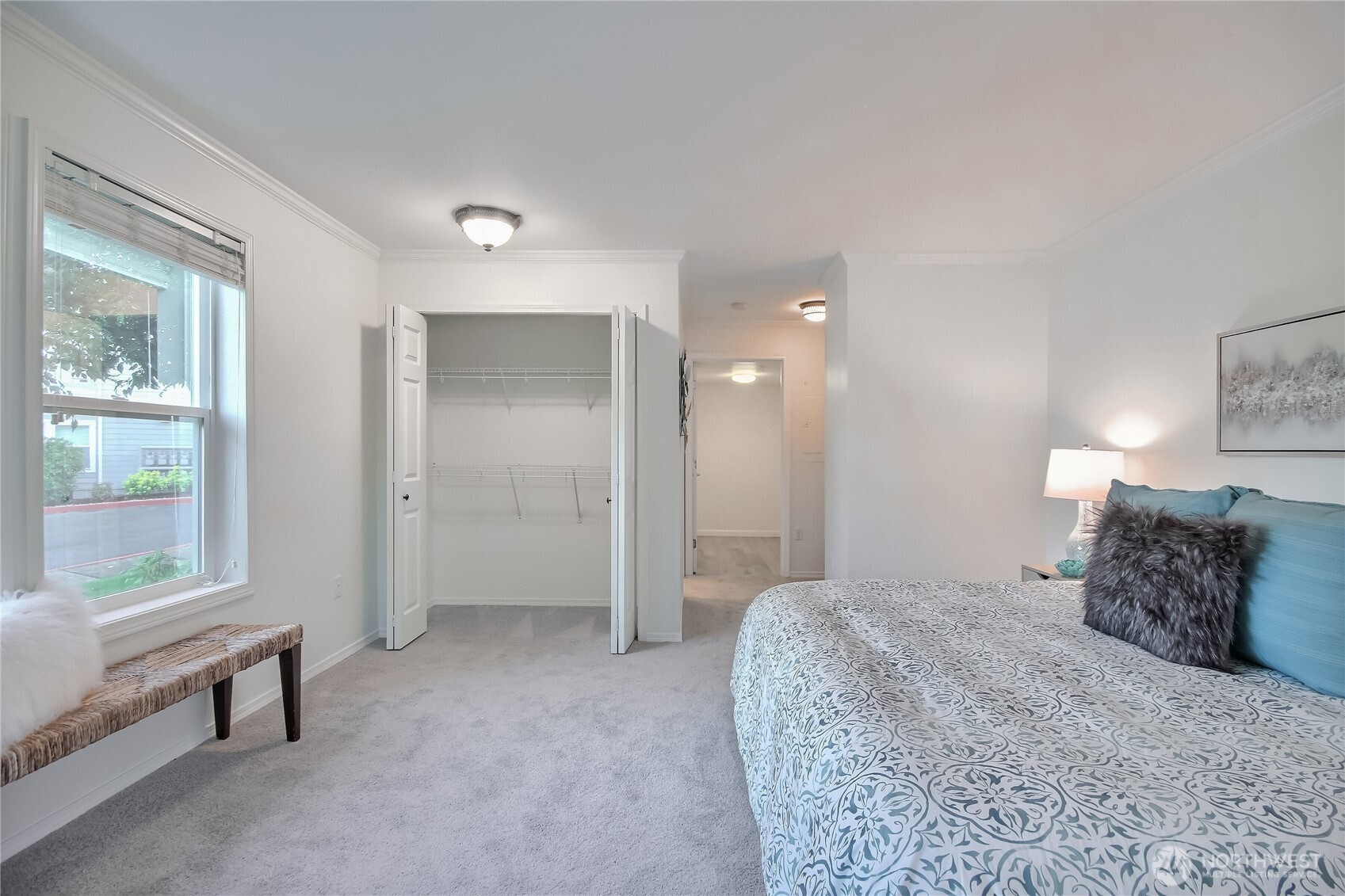 Primary bedroom has multiple closets including an oversized walk-in closet.