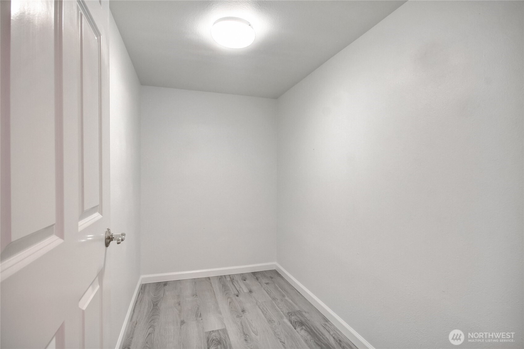 Amazing space in this large walk-in closet. Ready for your built-ins!