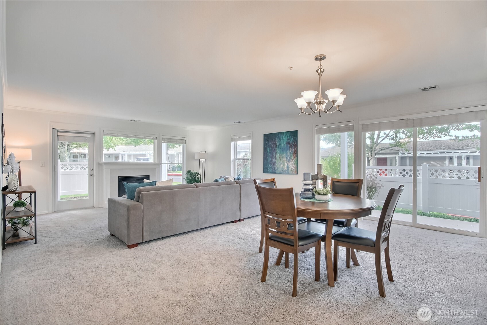 Dining room is large enough for any sized table. Slider to one of your two patios.