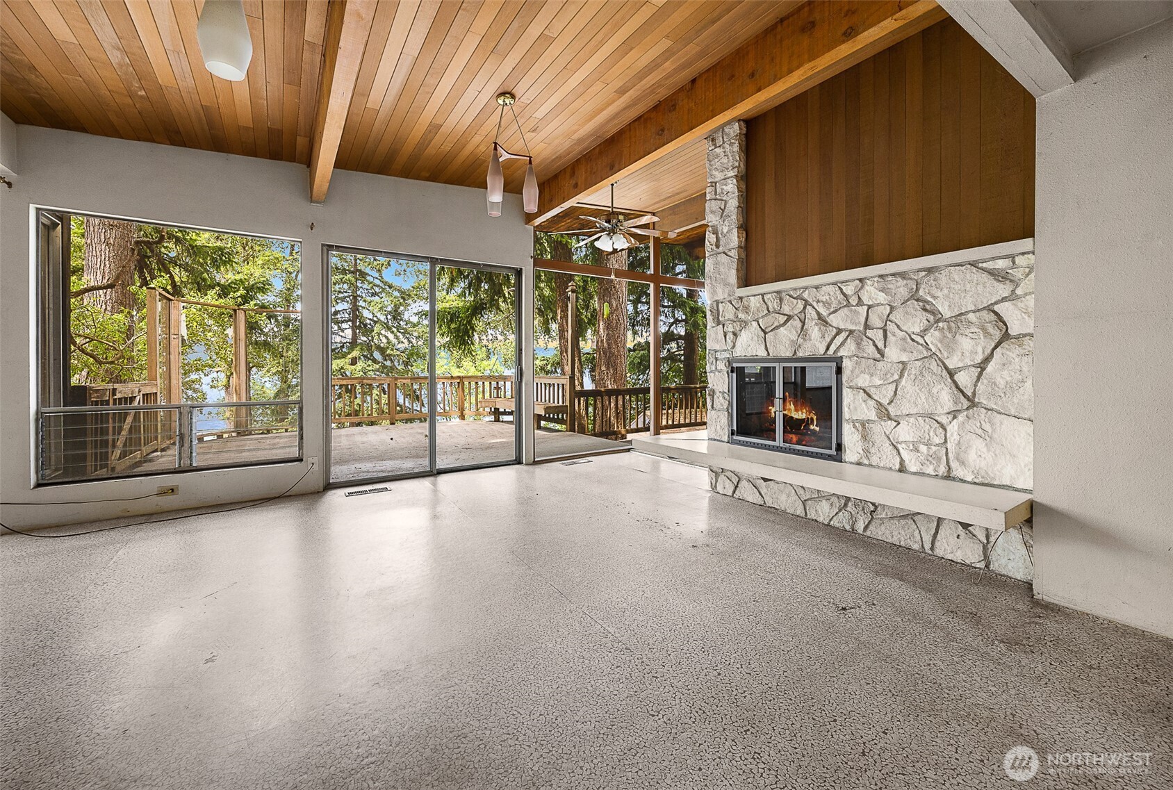 Upstairs family room - 1 of 3 fireplaces.