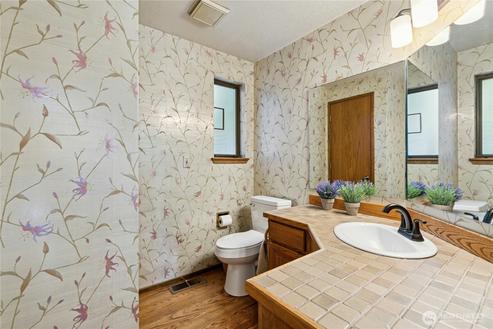 Powder room/half bath on main for convenience.