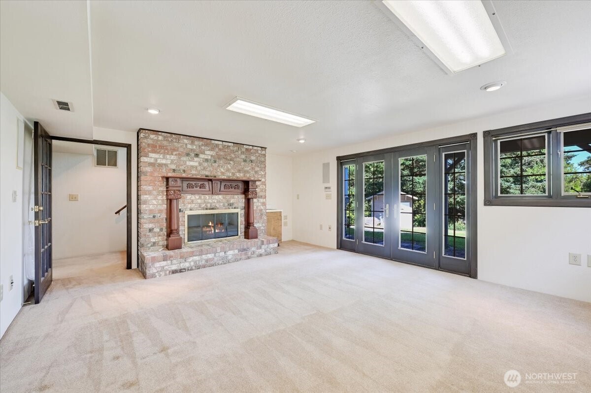 Rec room features fireplace, wet bar and surround sound