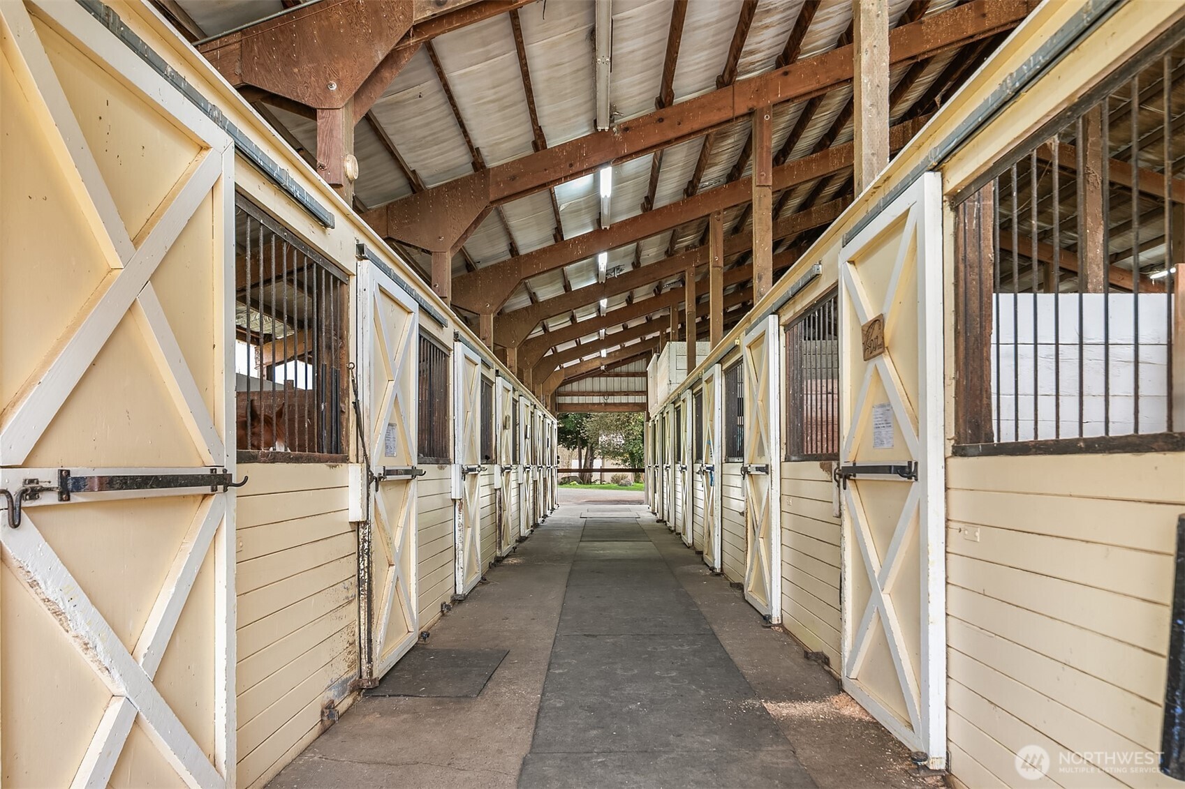 Older Barn has two walkways, loft, office, blanket stall, wash rack, and several grooming space options