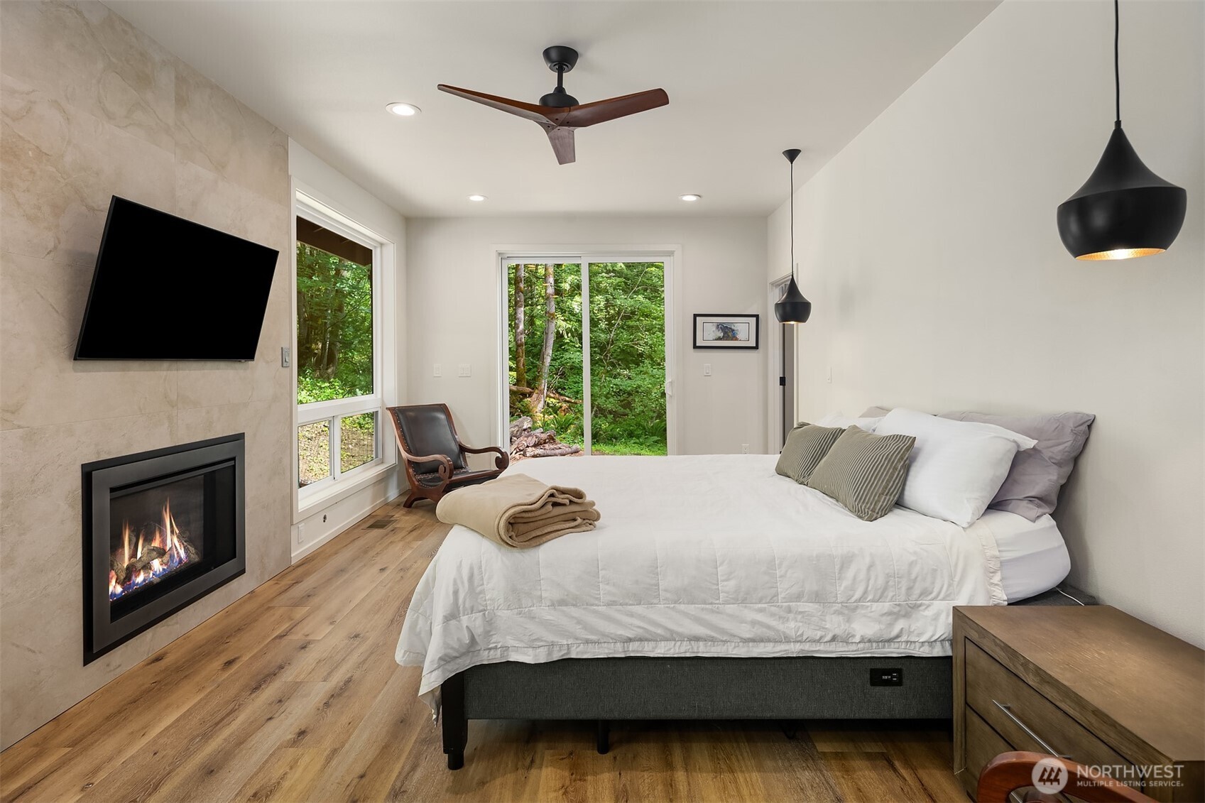 Newly built 714 sq. ft. primary suite with a romantic fireplace.