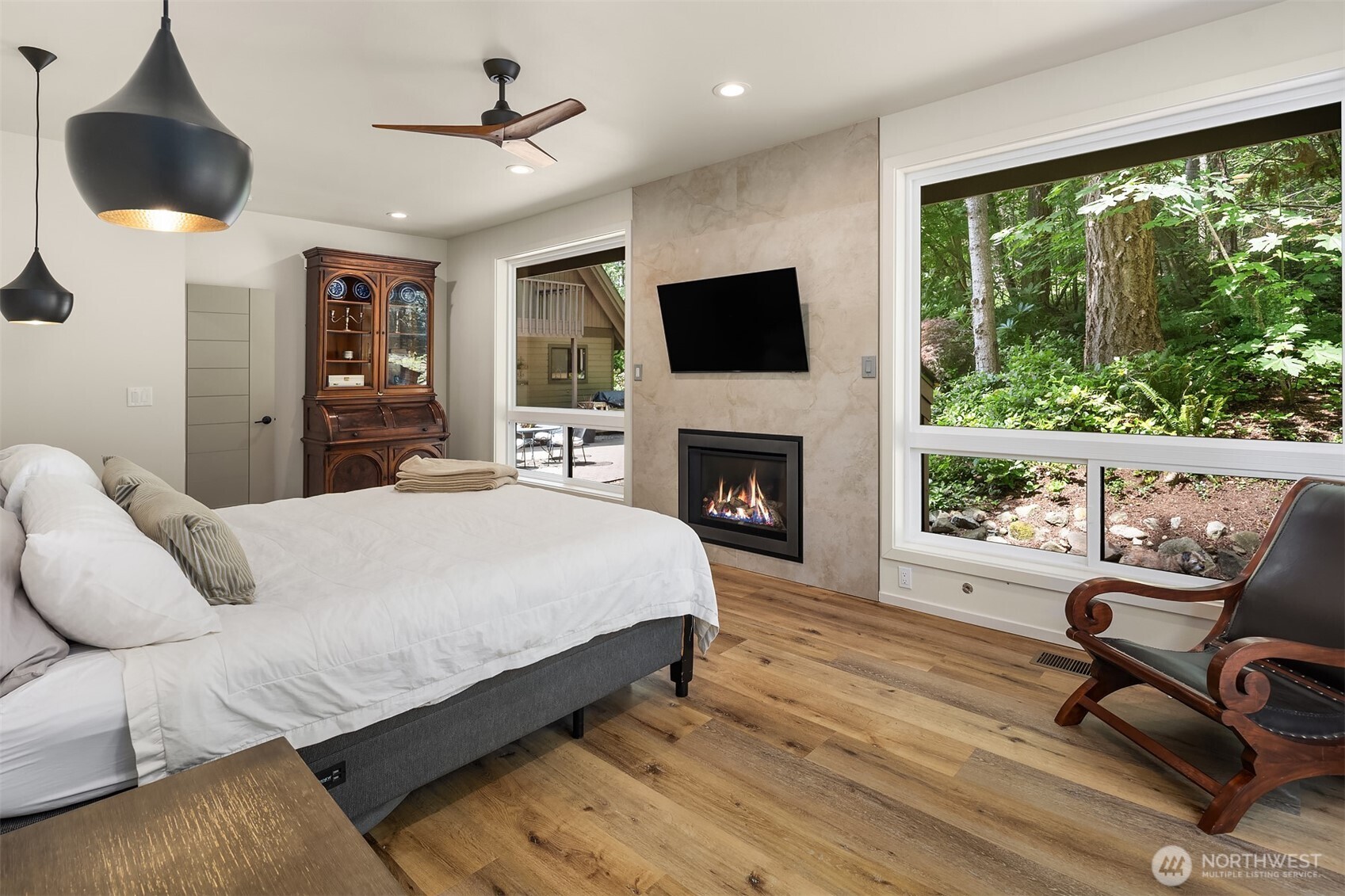 The primary bedroom with a private bath is a true retreat