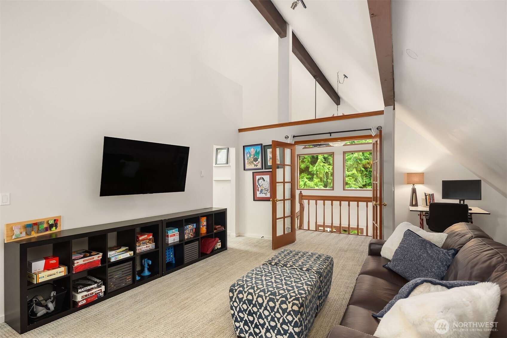 French doors open to the upper level bonus room with flexible options.