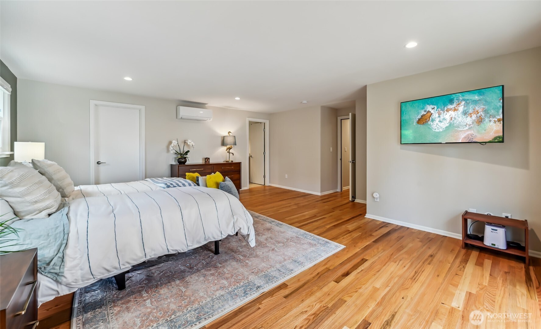 Primary suite is so large that there is room to put a reading nook, or add exercise equipment to work out.