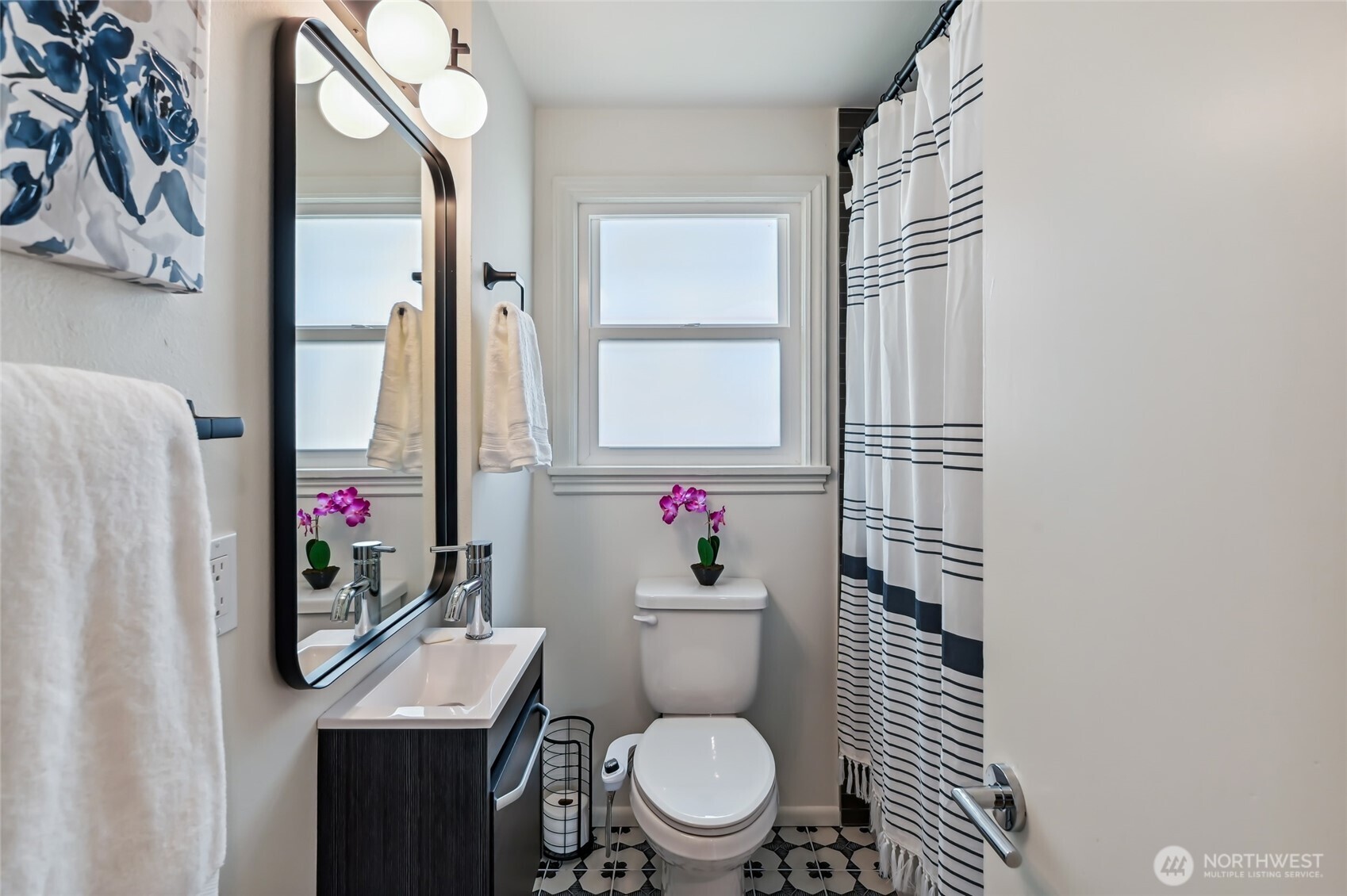 Full guest bathroom has designer touches and finishes.