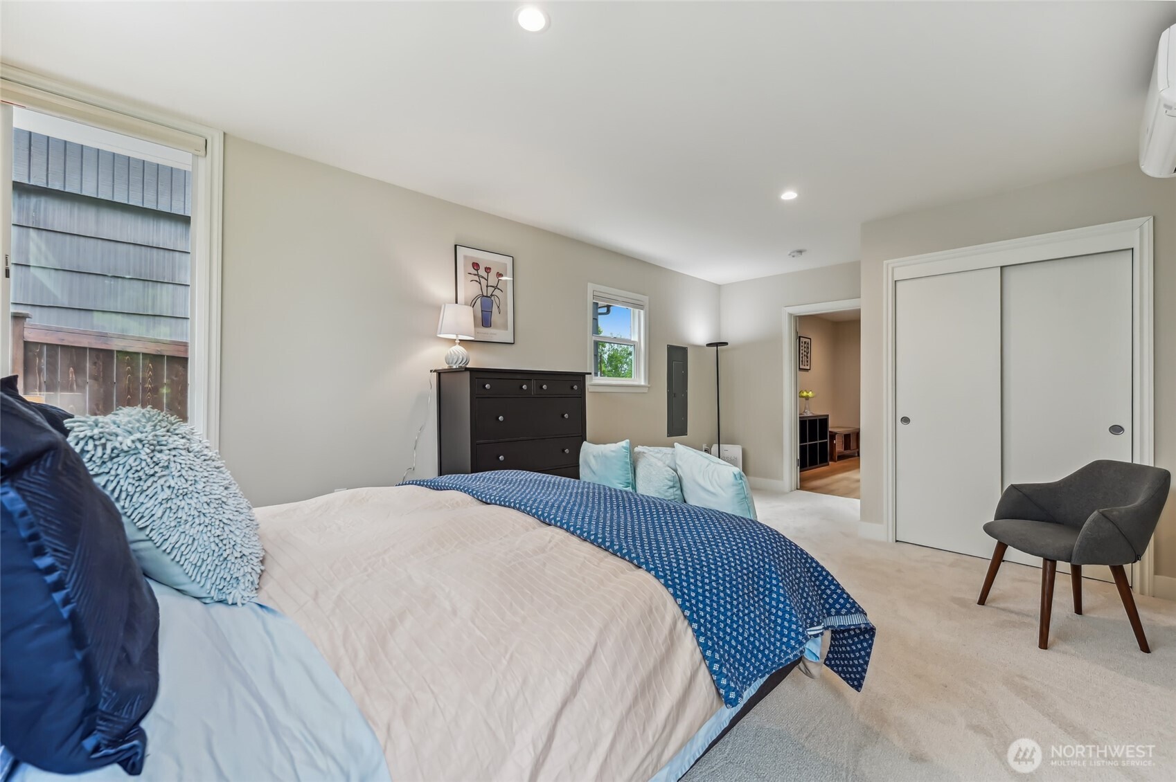Second living space can also be used as a second primary bedroom. There is a 3/4 bathroom adjacent to the room. Large closet for all your items.