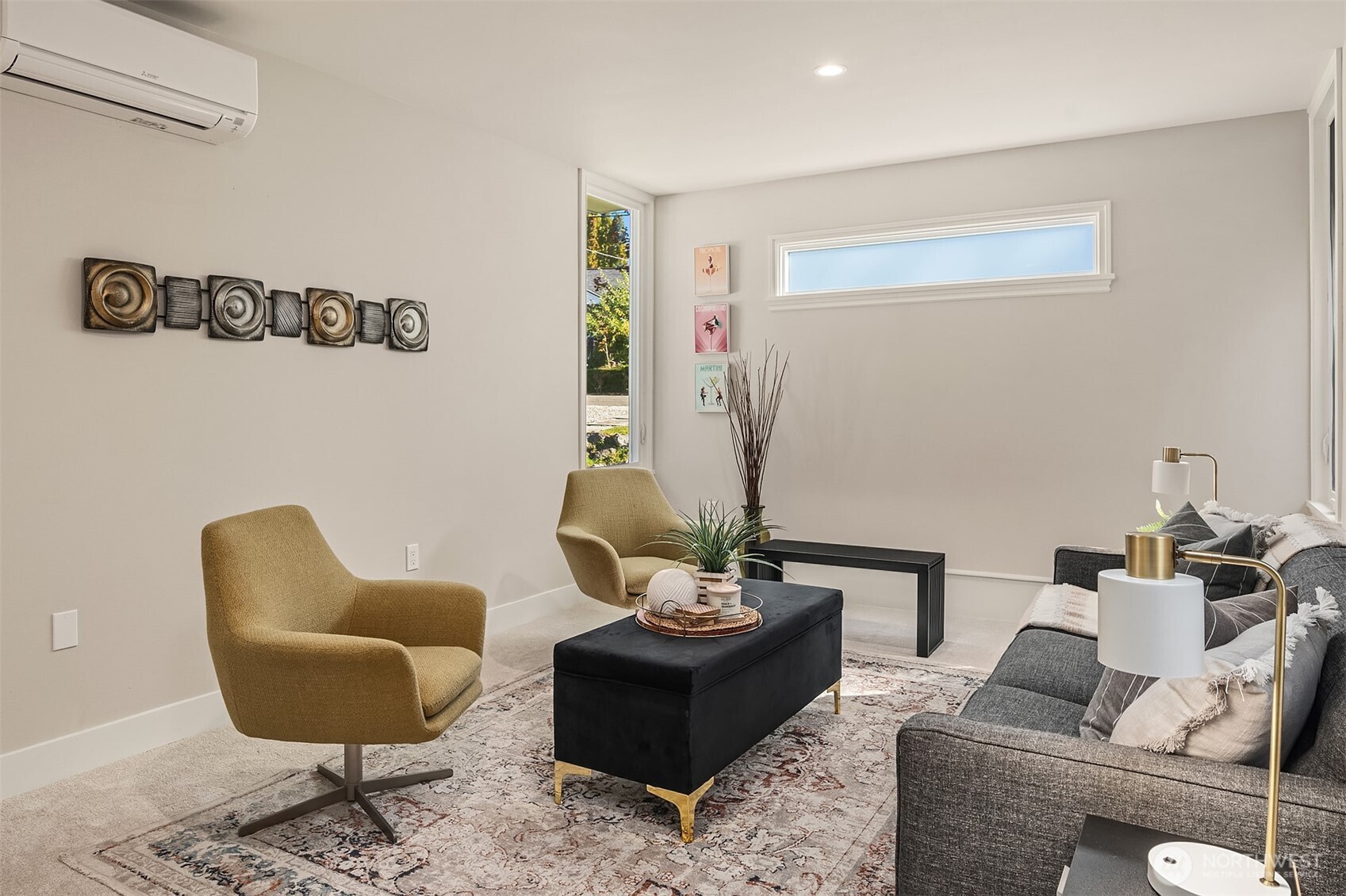Second living space has its own mini-split air conditioning unit. This could easily be used as a second primary bedroom as it has its own bathroom. Picture is from a previous listing.