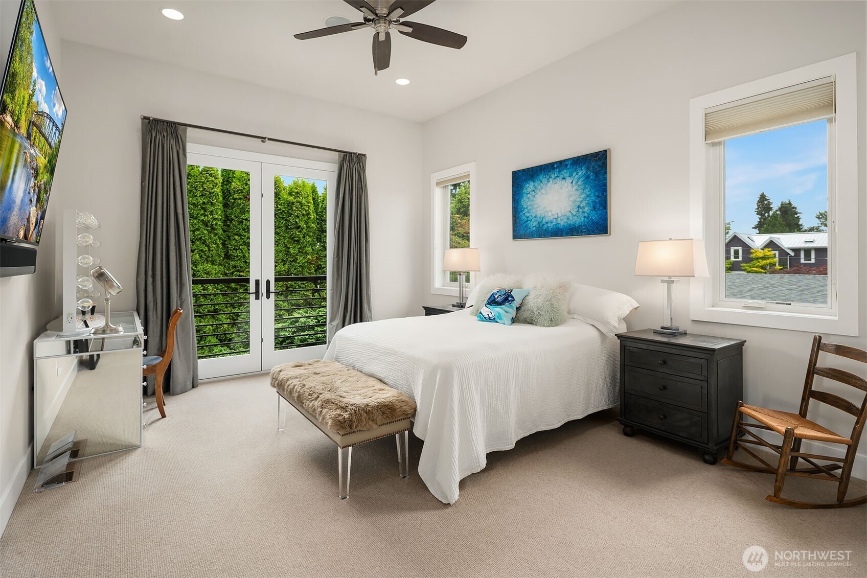 Primary bedroom with a Juliet balcony