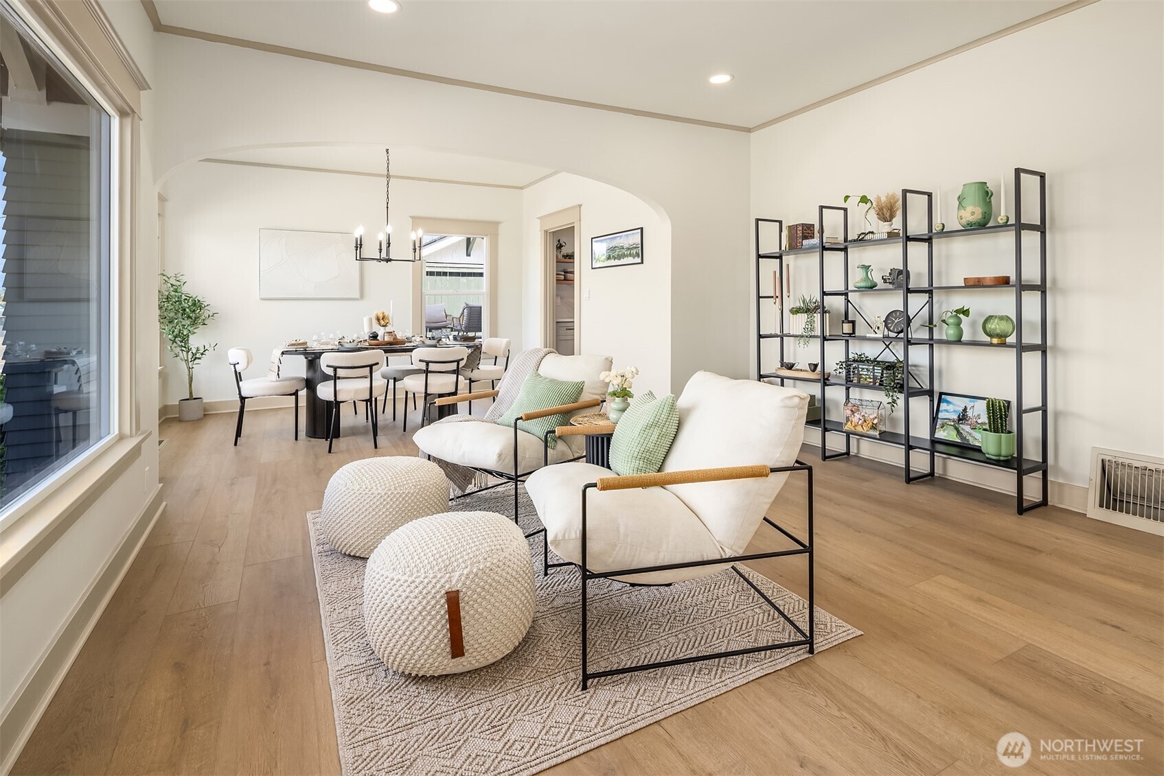 Arched door ways and tall ceilings make this space functional and inviting