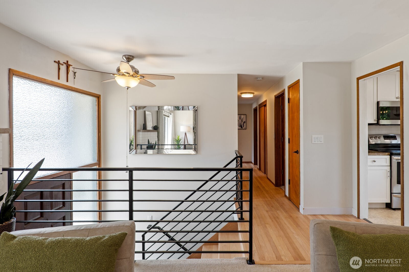 Updated railings and hardwood floors.