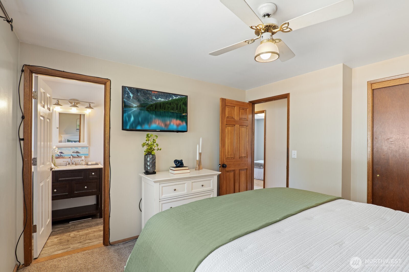 Primary suite has an updated 3/4 bath.