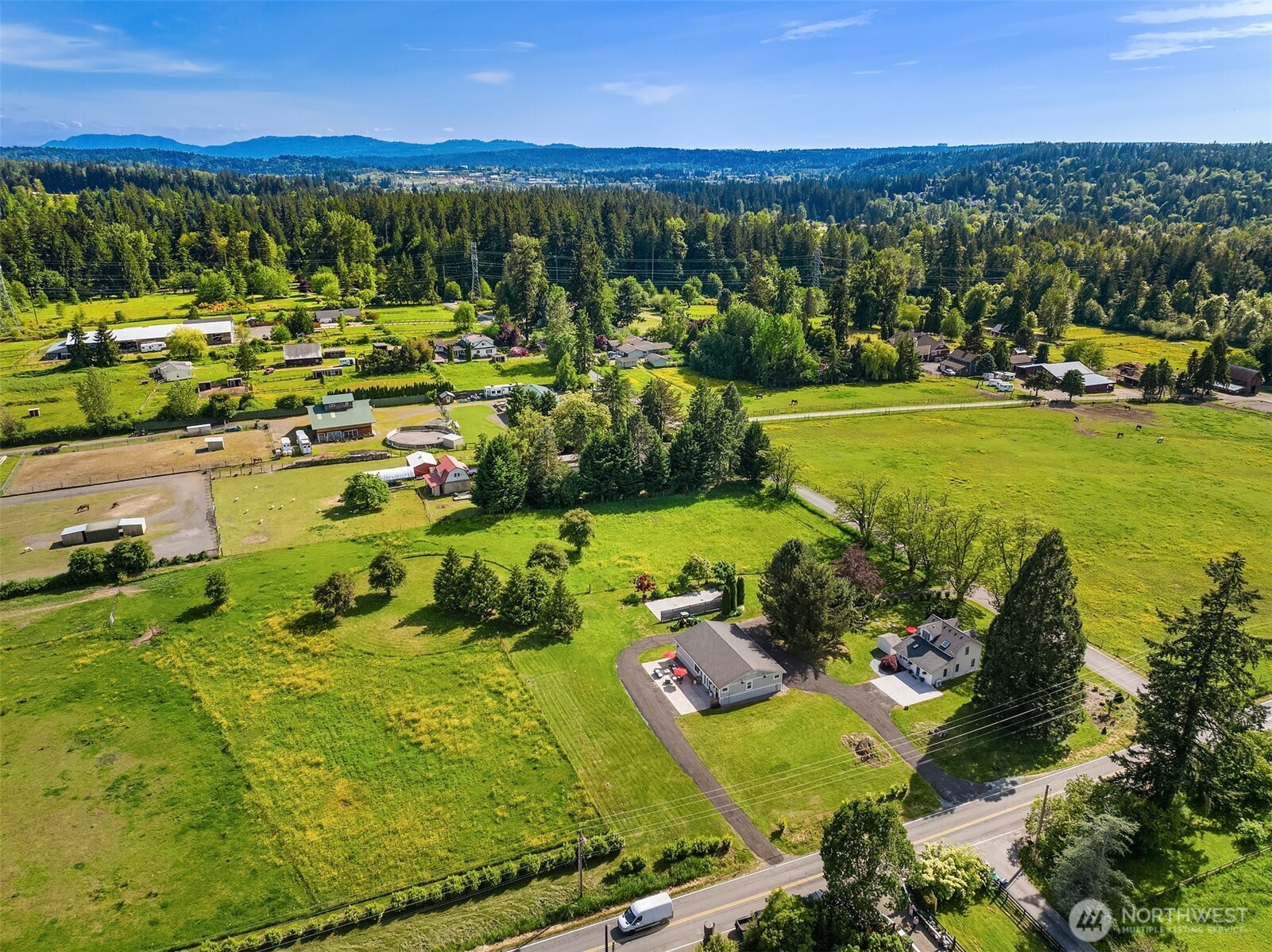 1 acre of living space and 4 acres of fenced pastures