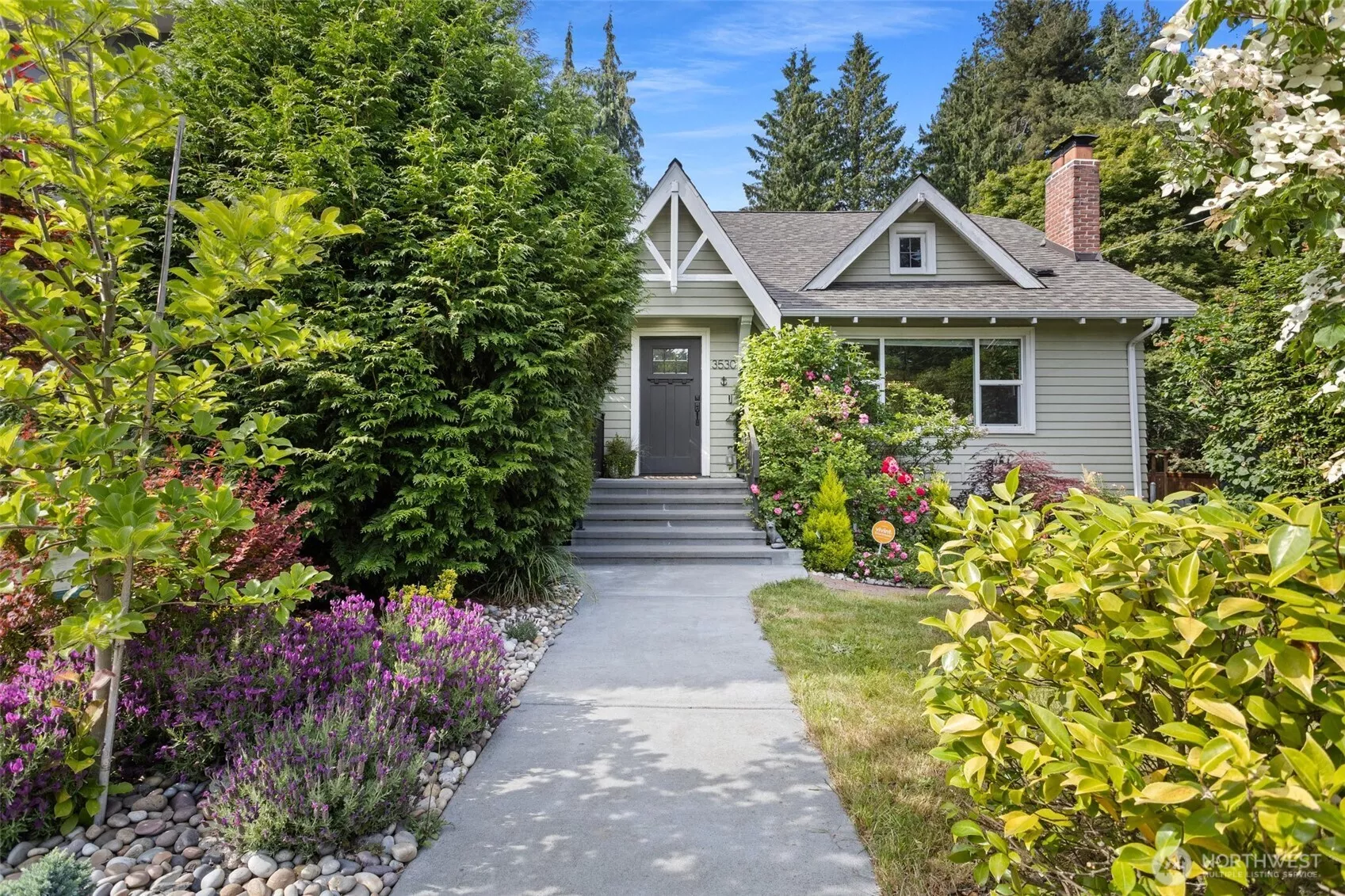 Front of house with gorgeous private garden